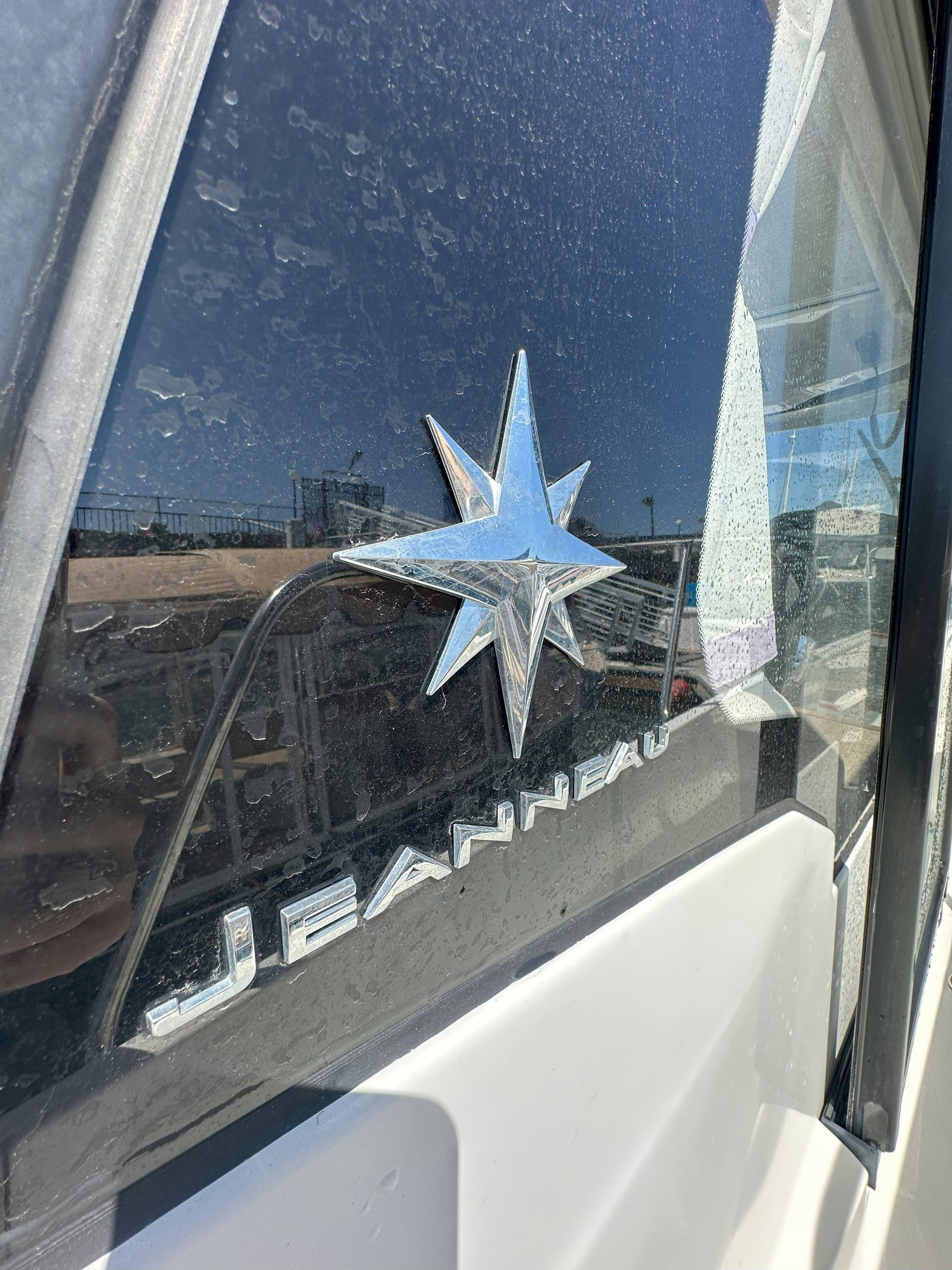 a plane on a window aboard DESTINATION UNKNOWN II Yacht for Sale