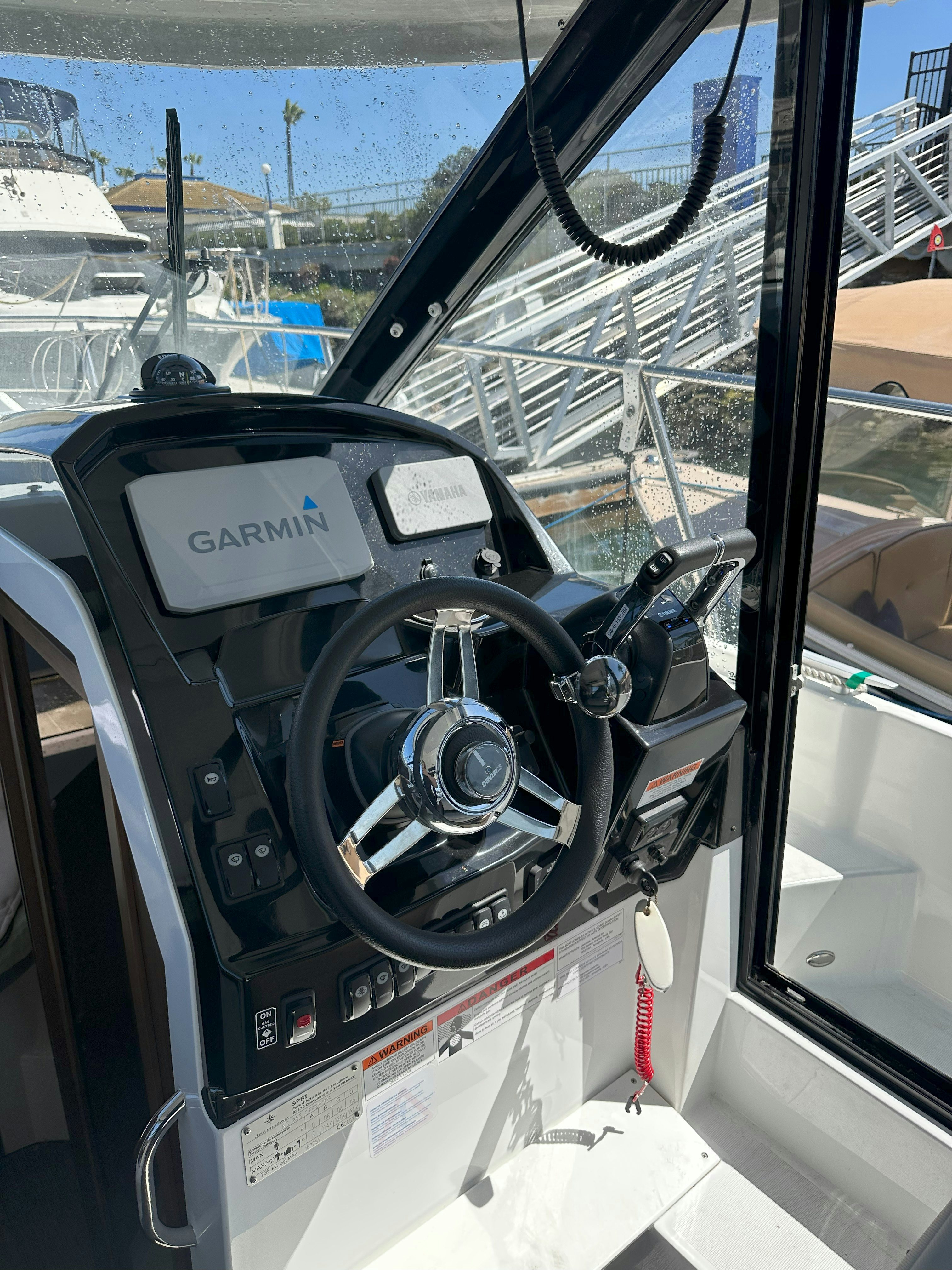 inside of a car aboard DESTINATION UNKNOWN II Yacht for Sale