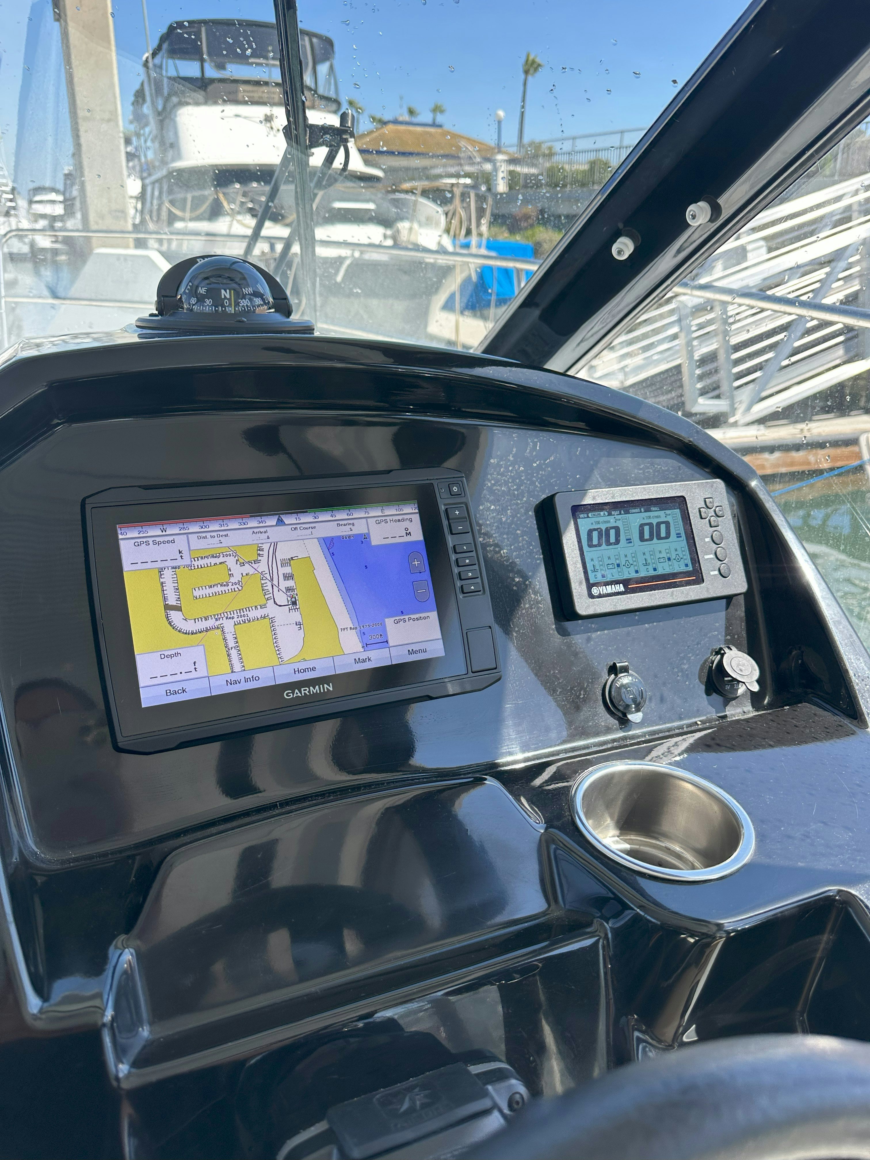 the inside of a car aboard DESTINATION UNKNOWN II Yacht for Sale