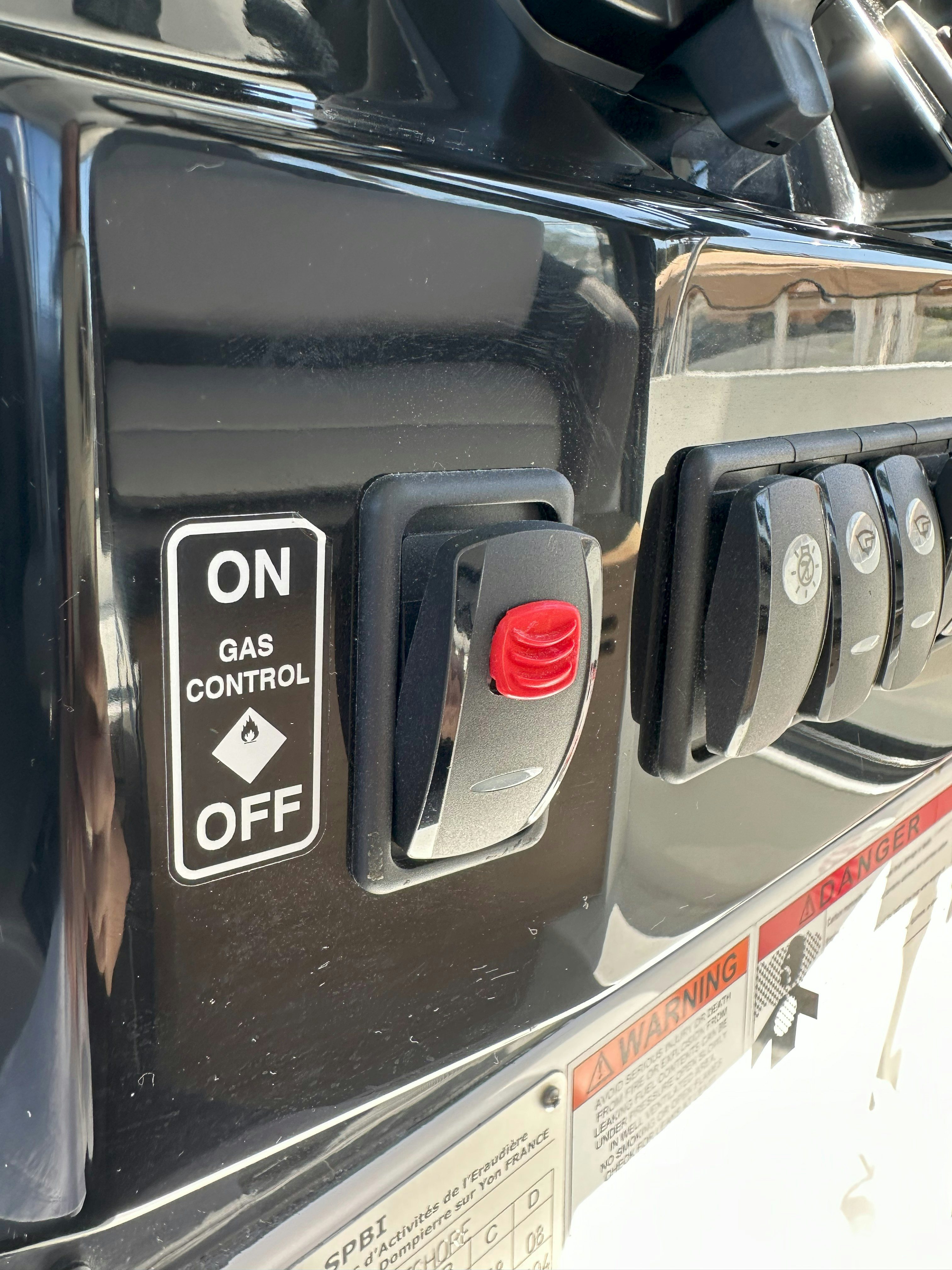 a car with a license plate aboard DESTINATION UNKNOWN II Yacht for Sale