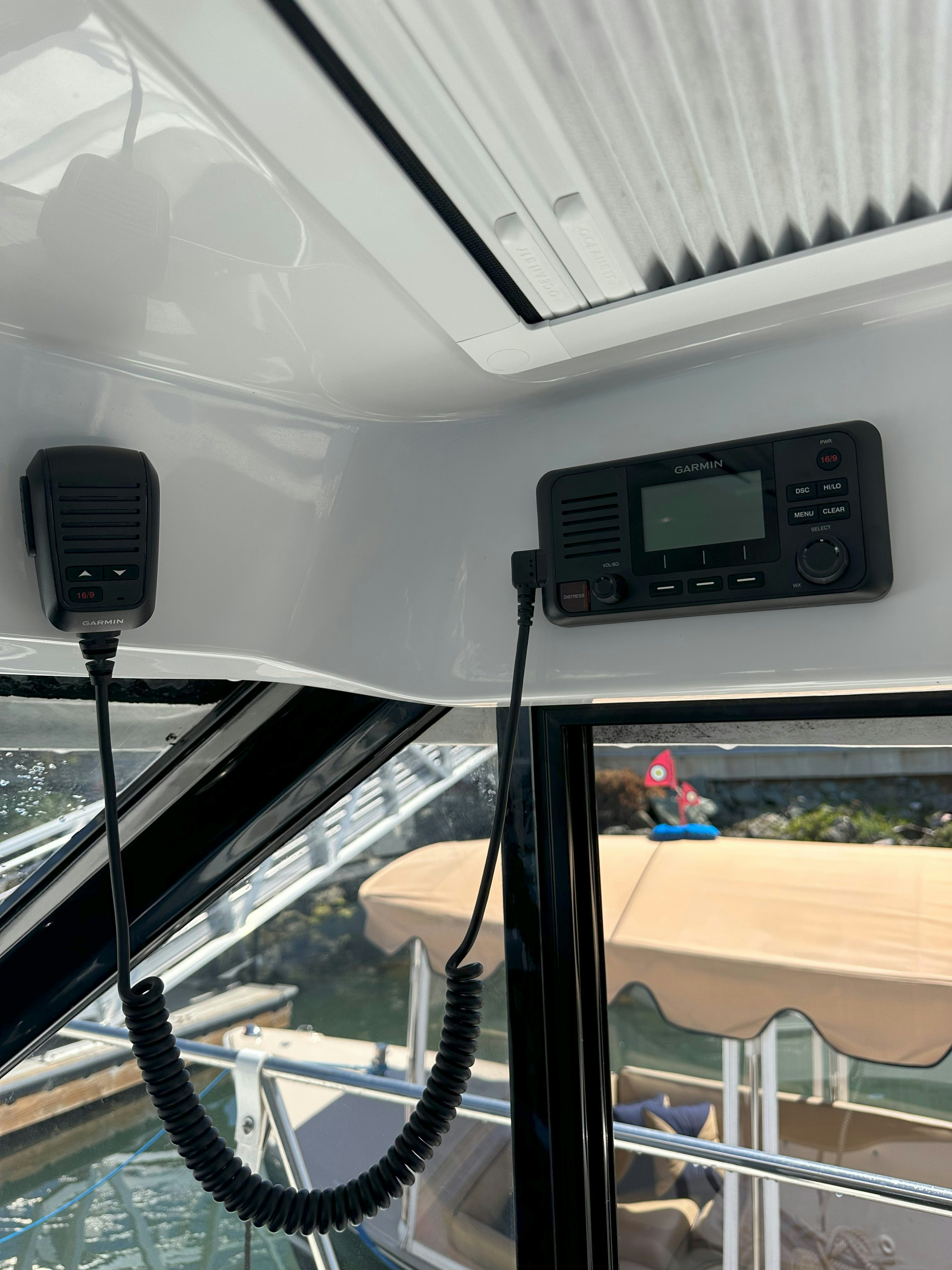 a car with a radio on the dashboard aboard DESTINATION UNKNOWN II Yacht for Sale