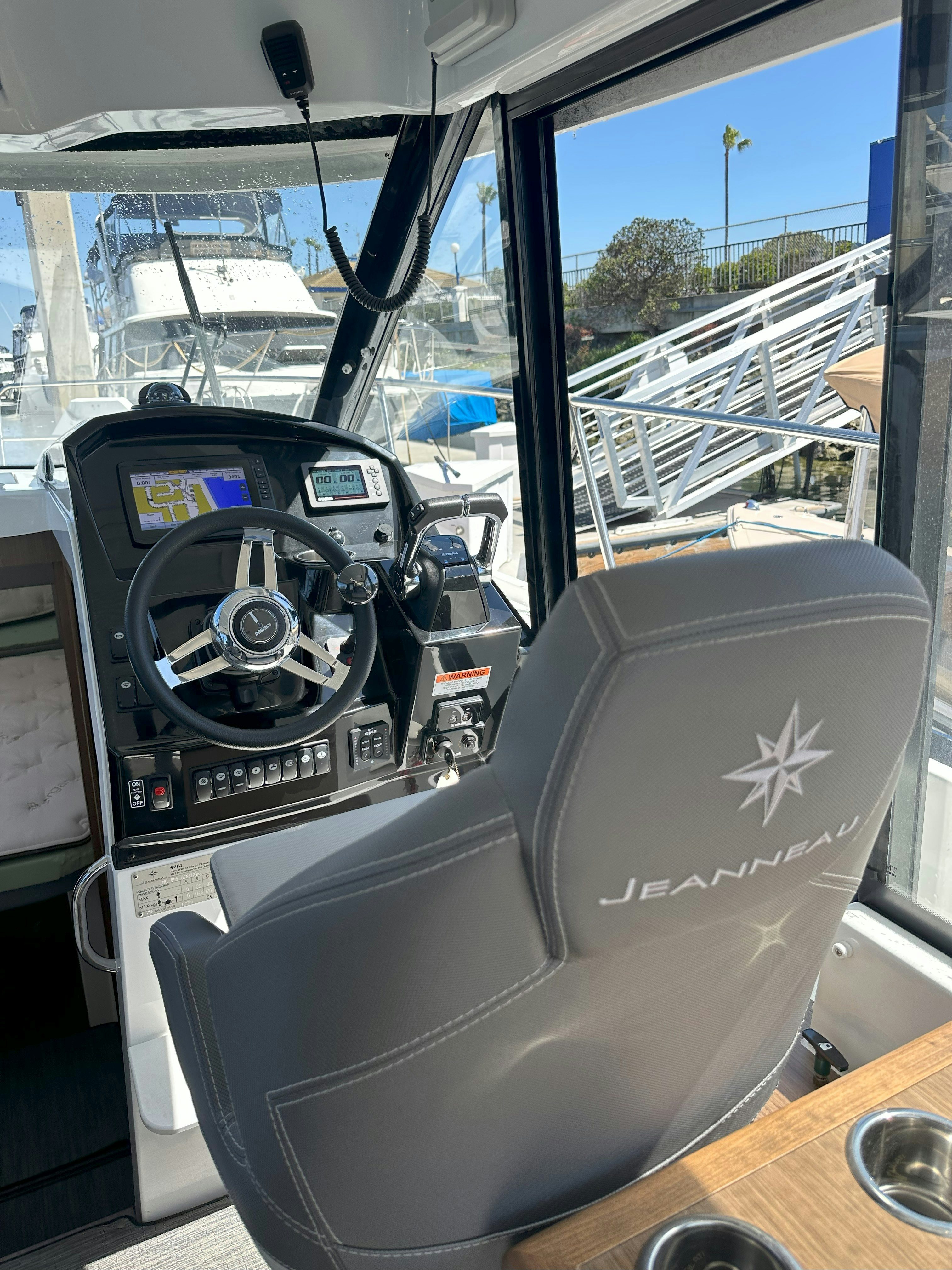 the inside of a car aboard DESTINATION UNKNOWN II Yacht for Sale