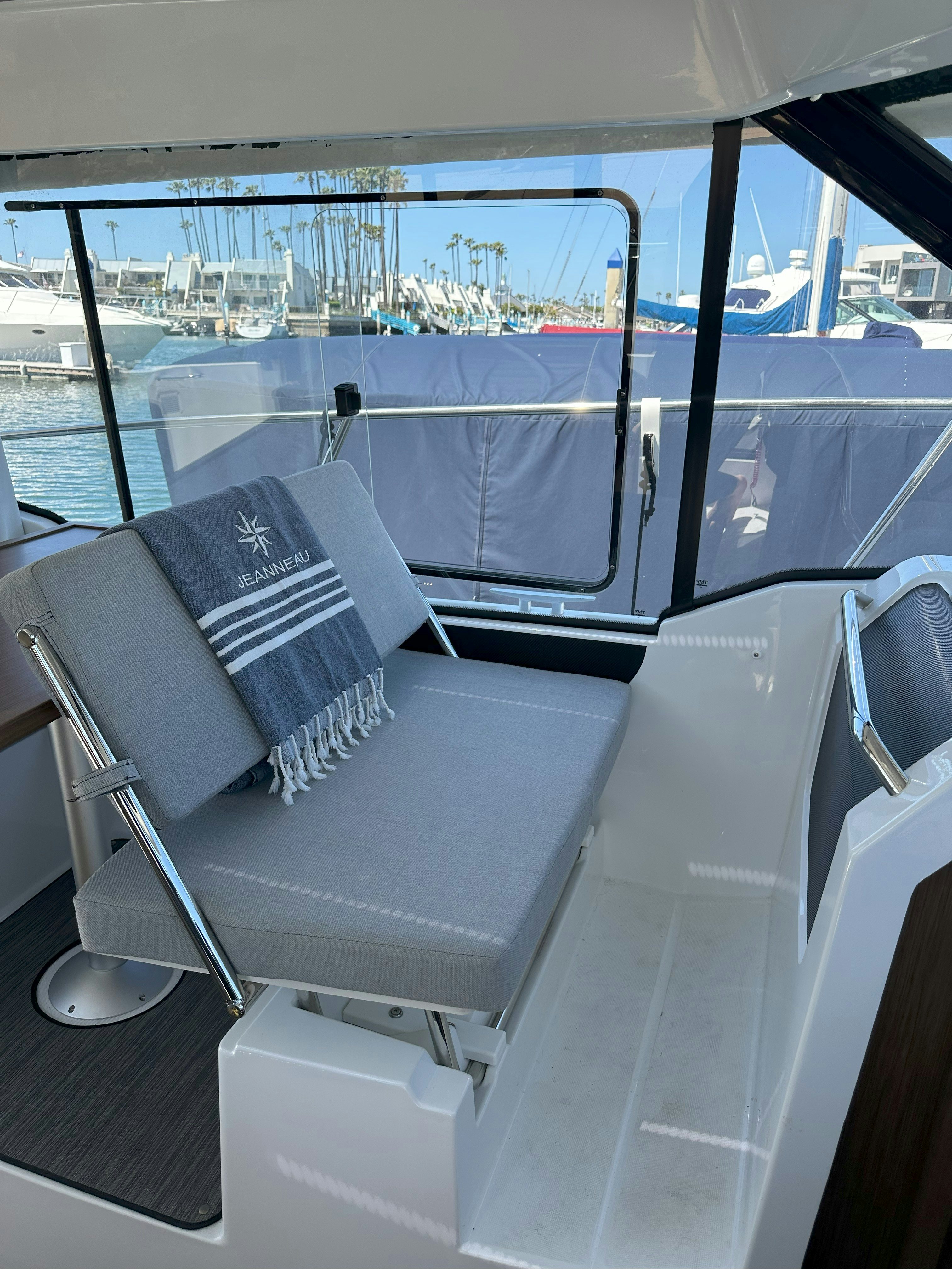 inside of a car aboard DESTINATION UNKNOWN II Yacht for Sale