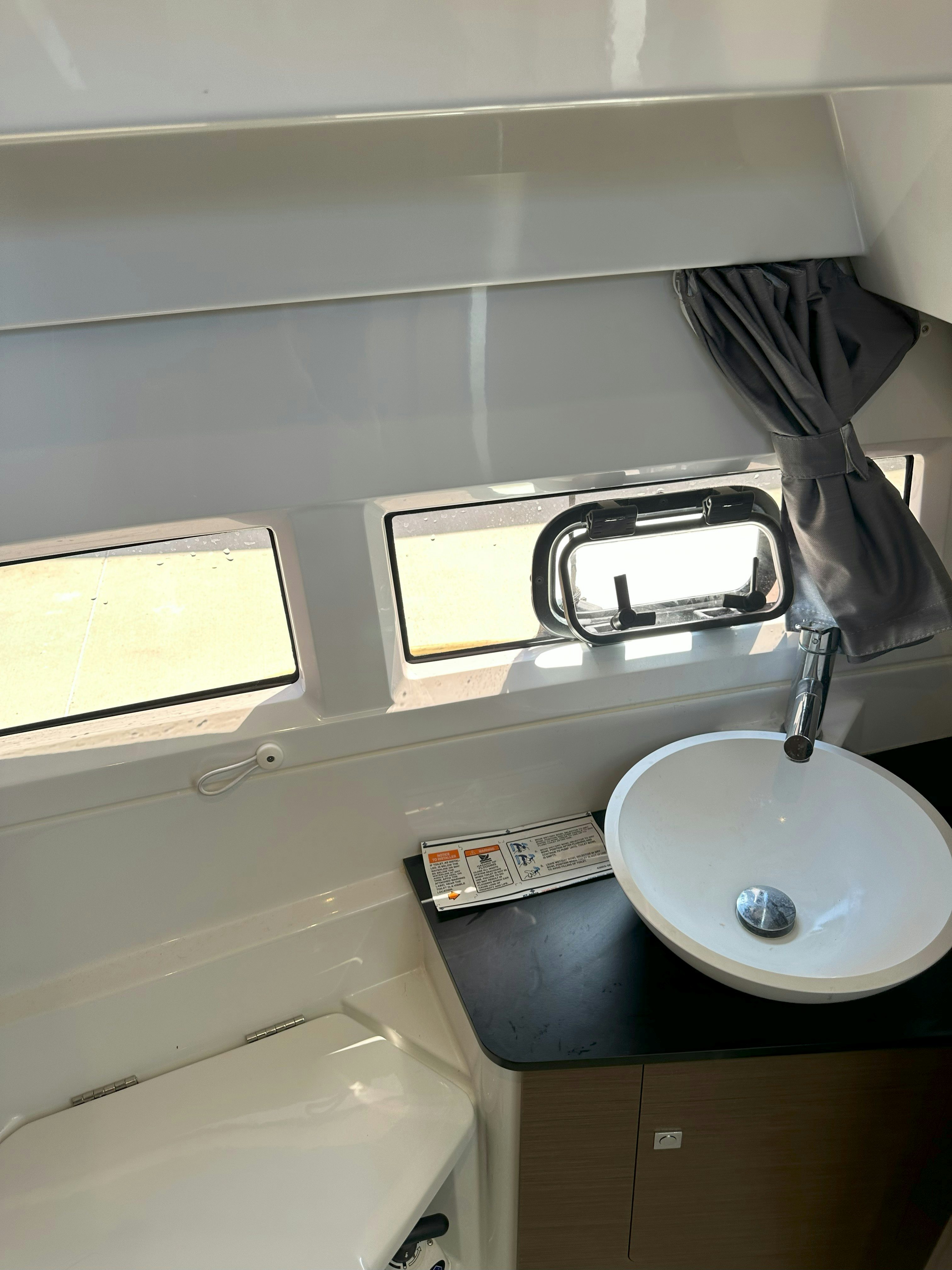 a sink with a faucet aboard DESTINATION UNKNOWN II Yacht for Sale