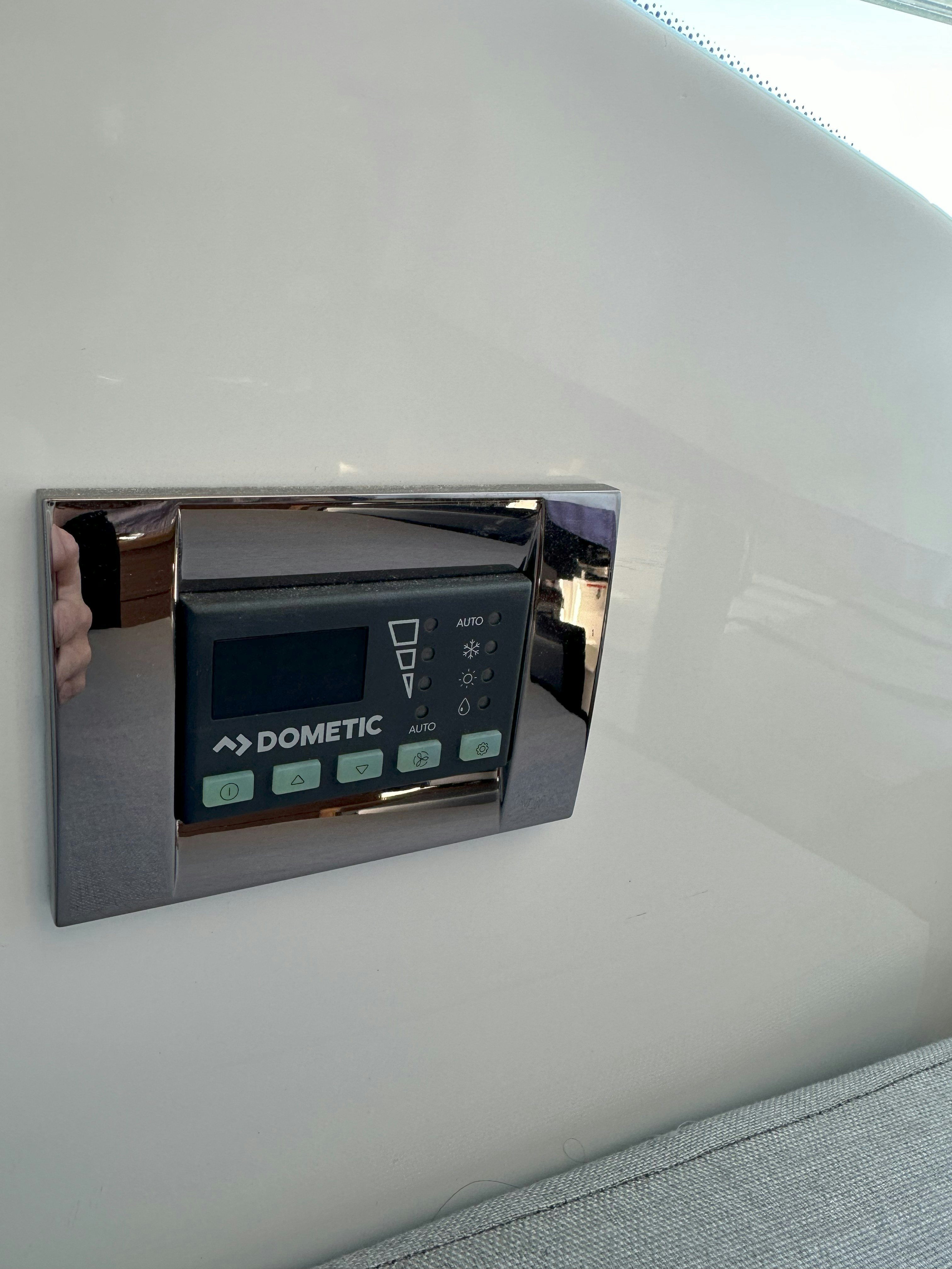 a rectangular electronic device aboard DESTINATION UNKNOWN II Yacht for Sale