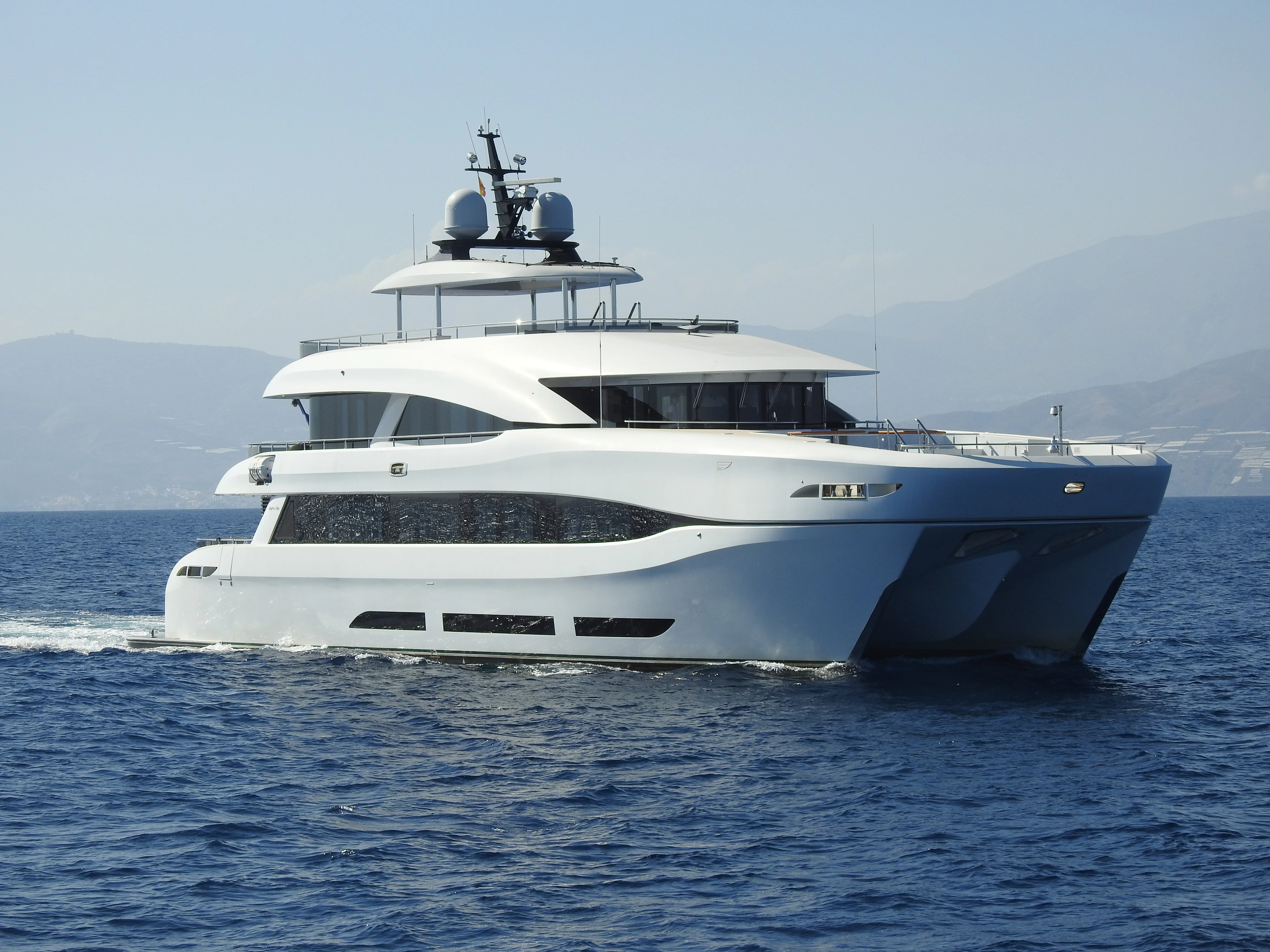 a white yacht on the water aboard SHU U RITE Yacht for Sale