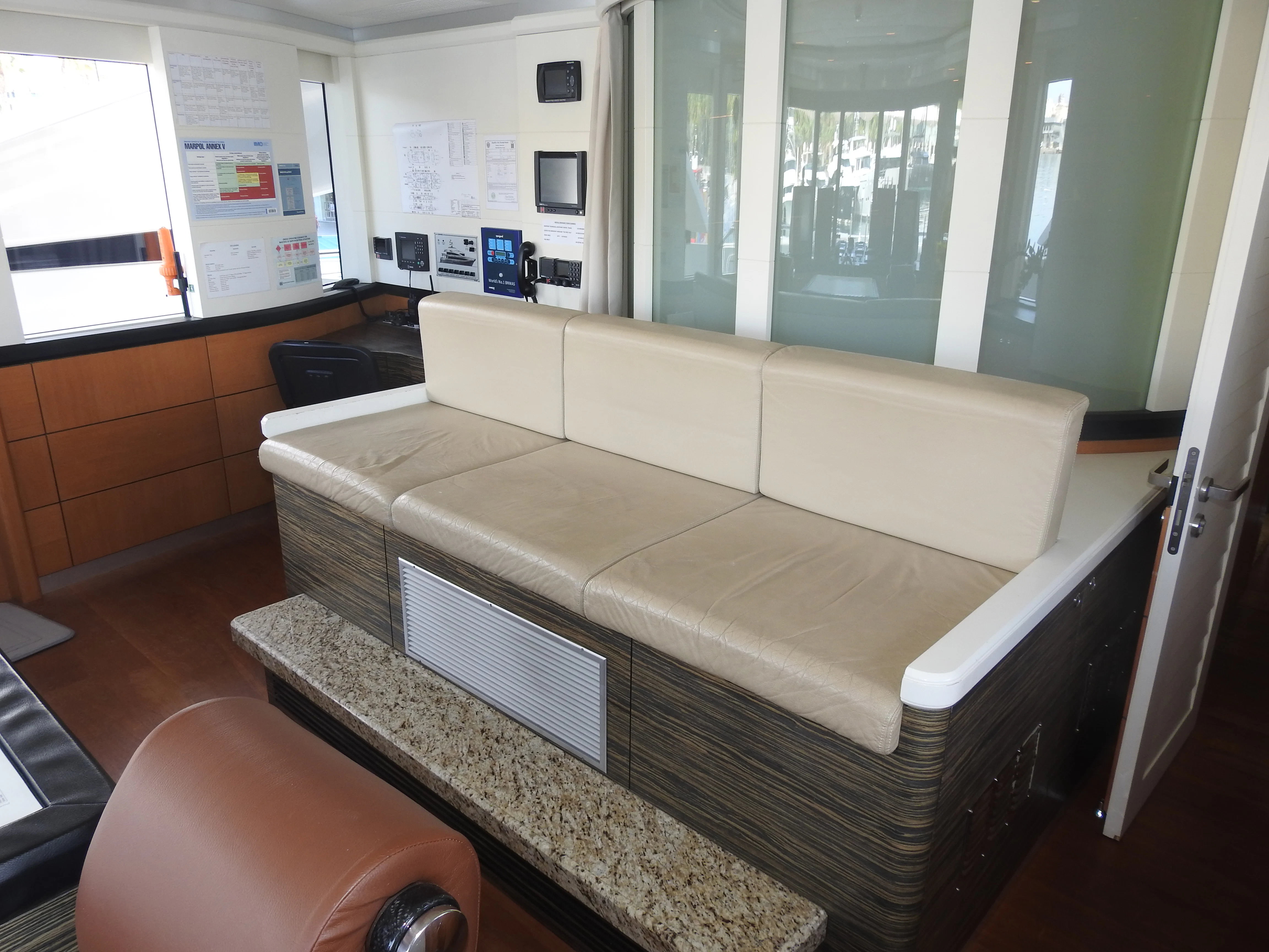 a couch in a room aboard SHU U RITE Yacht for Sale