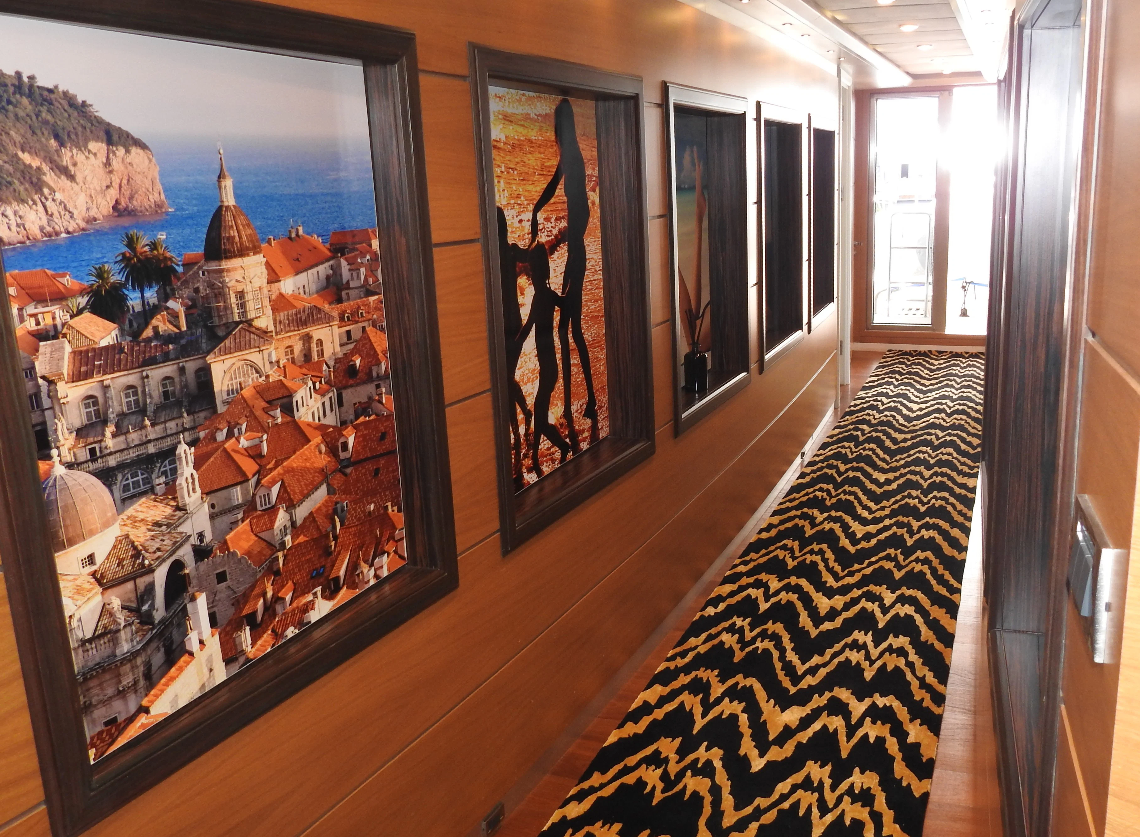 a framed painting on a wall aboard SHU U RITE Yacht for Sale