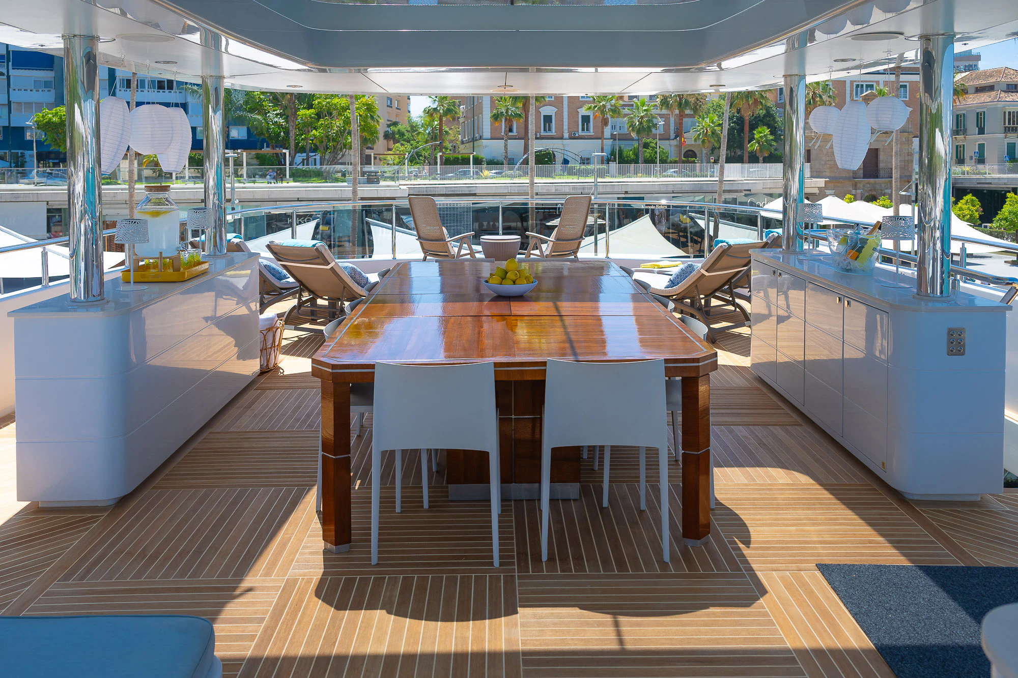 a room with tables and chairs aboard SHU U RITE Yacht for Sale