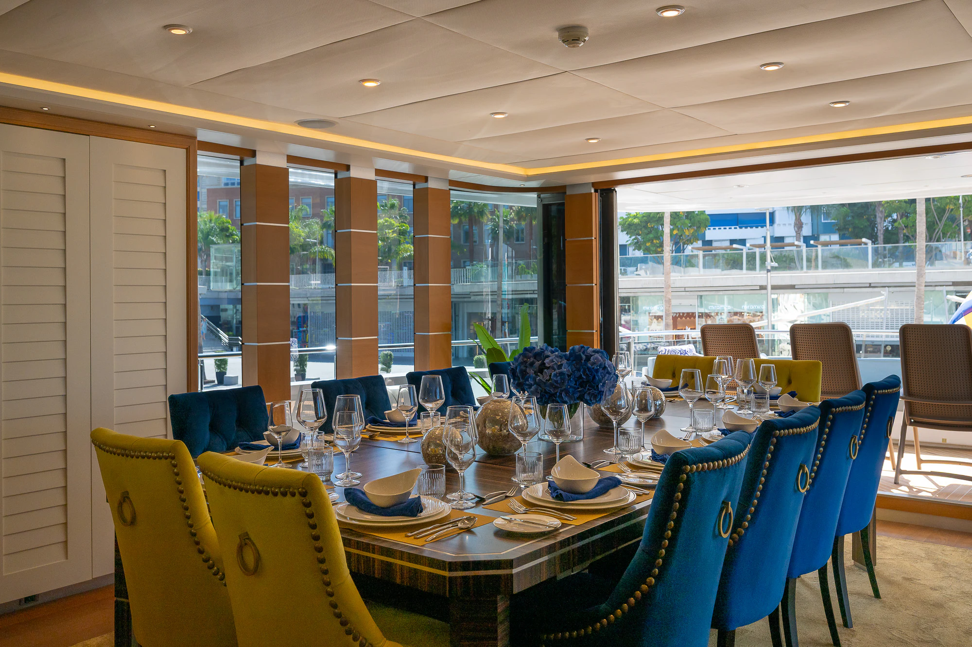 a table set for a dinner aboard SHU U RITE Yacht for Sale