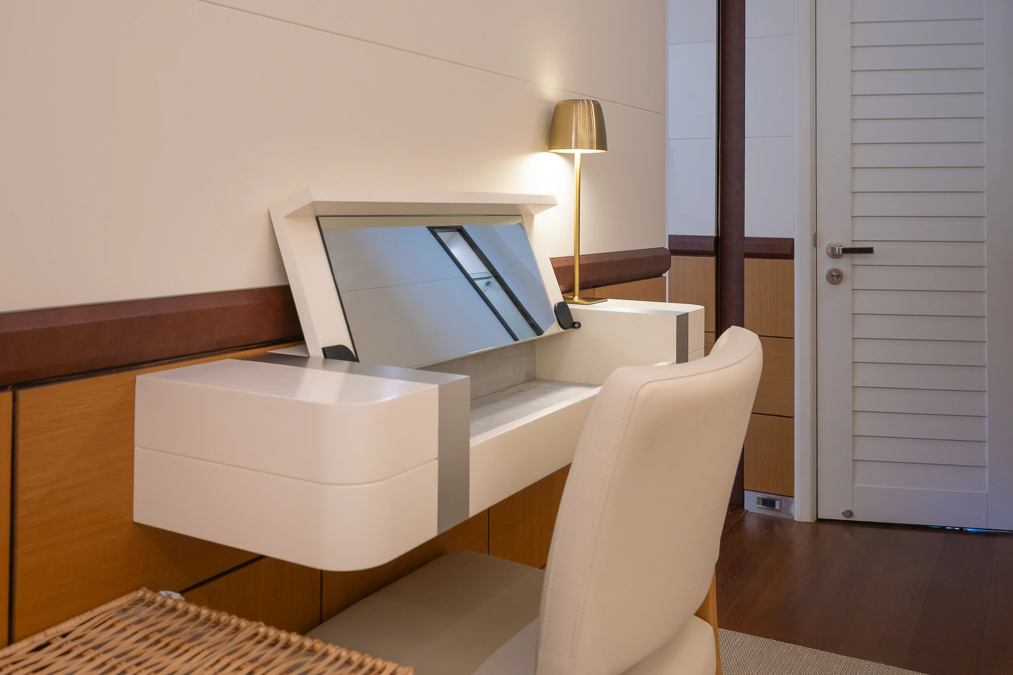 a white chair in a room aboard SHU U RITE Yacht for Sale