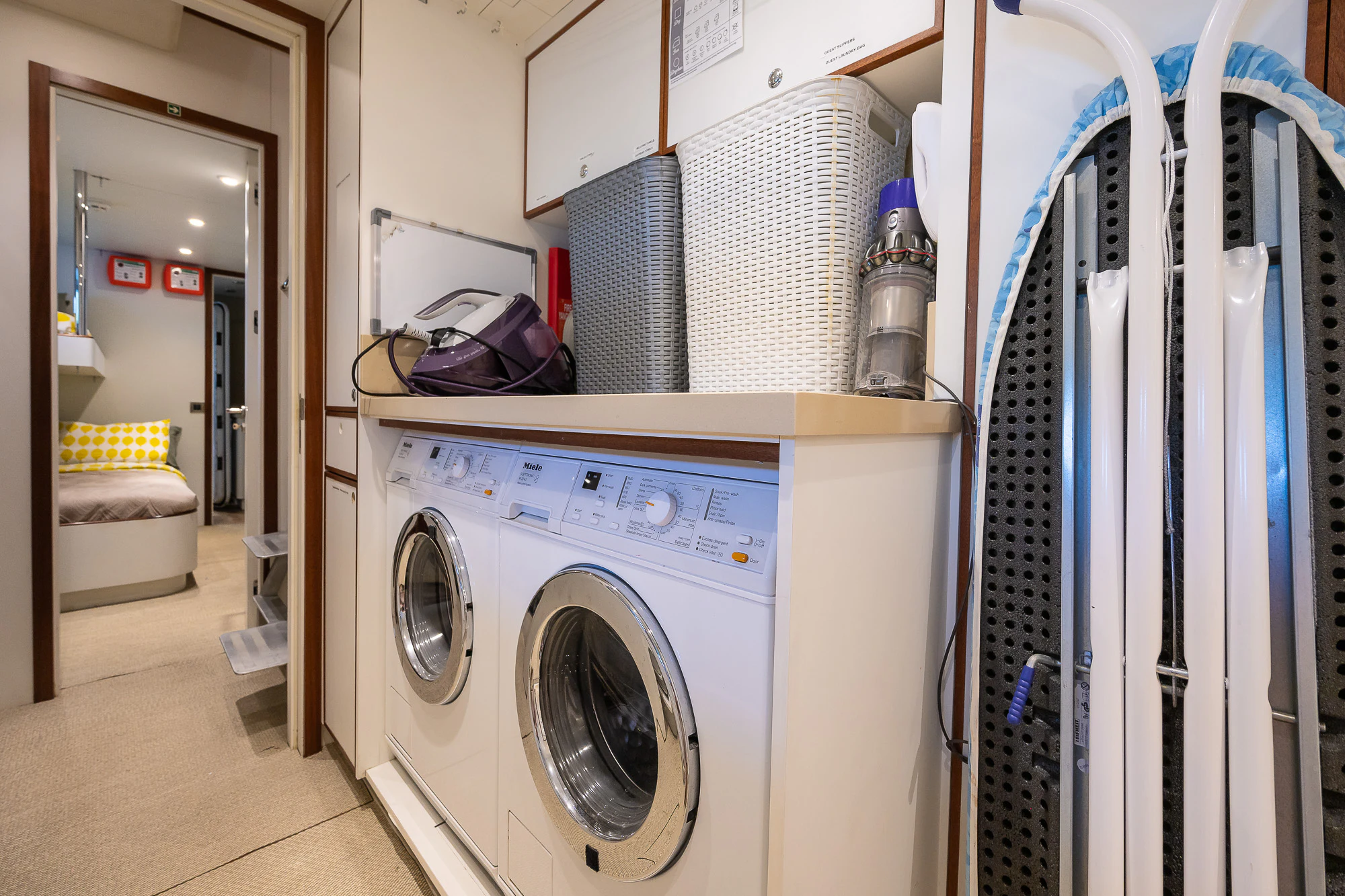 a laundry room with a washing machine aboard SHU U RITE Yacht for Sale