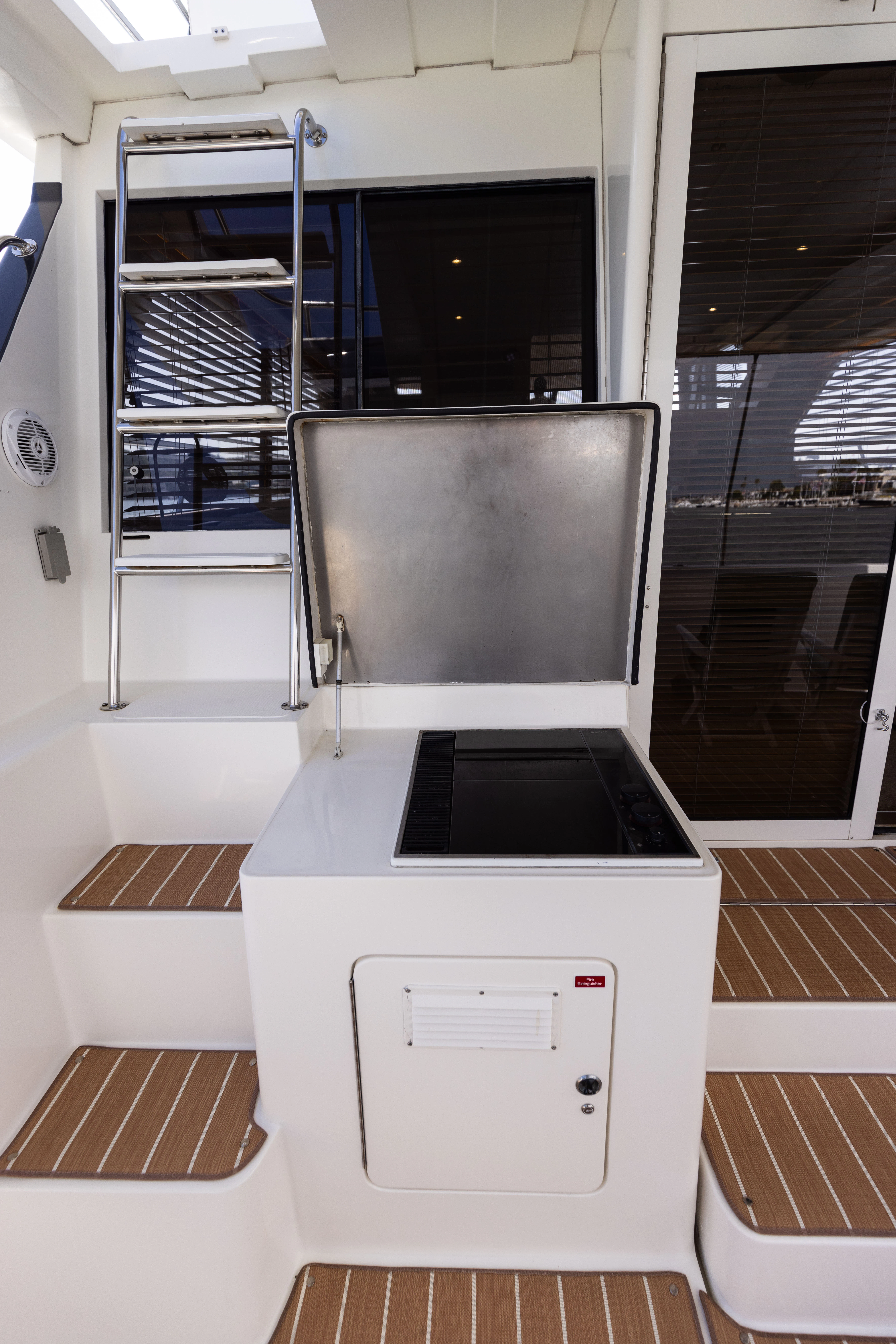 a large machine in a room aboard 3TEN Yacht for Sale