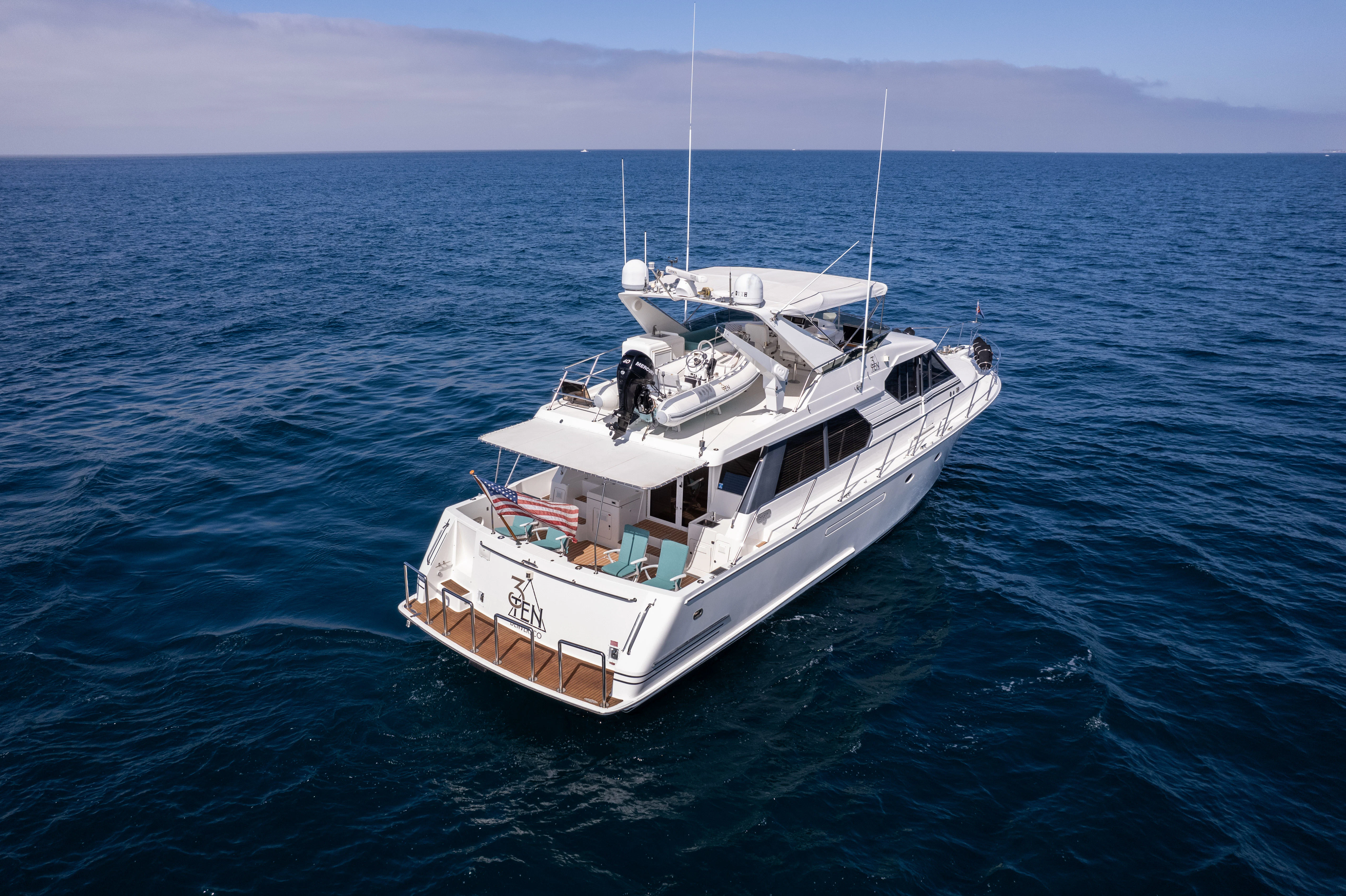 a boat in the water aboard 3TEN Yacht for Sale