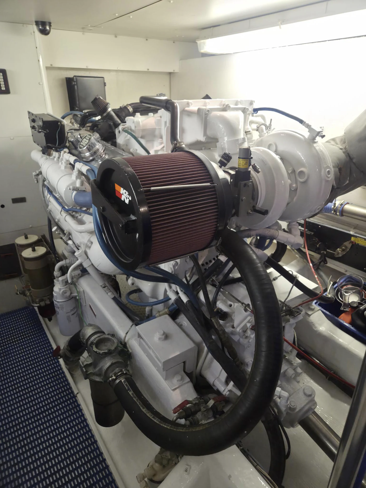 a machine with a large engine aboard 3TEN Yacht for Sale