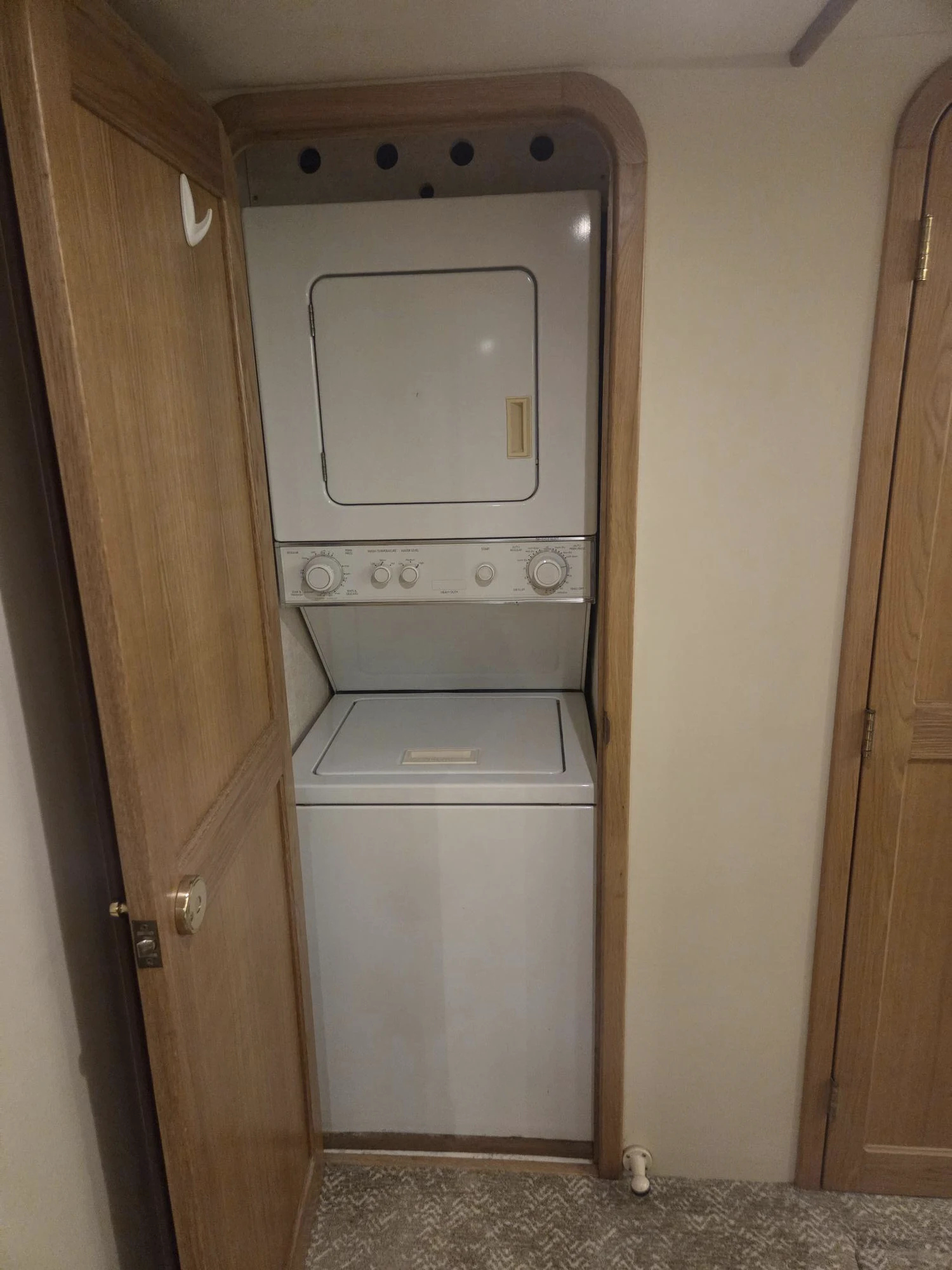 a group of white cabinets aboard 3TEN Yacht for Sale