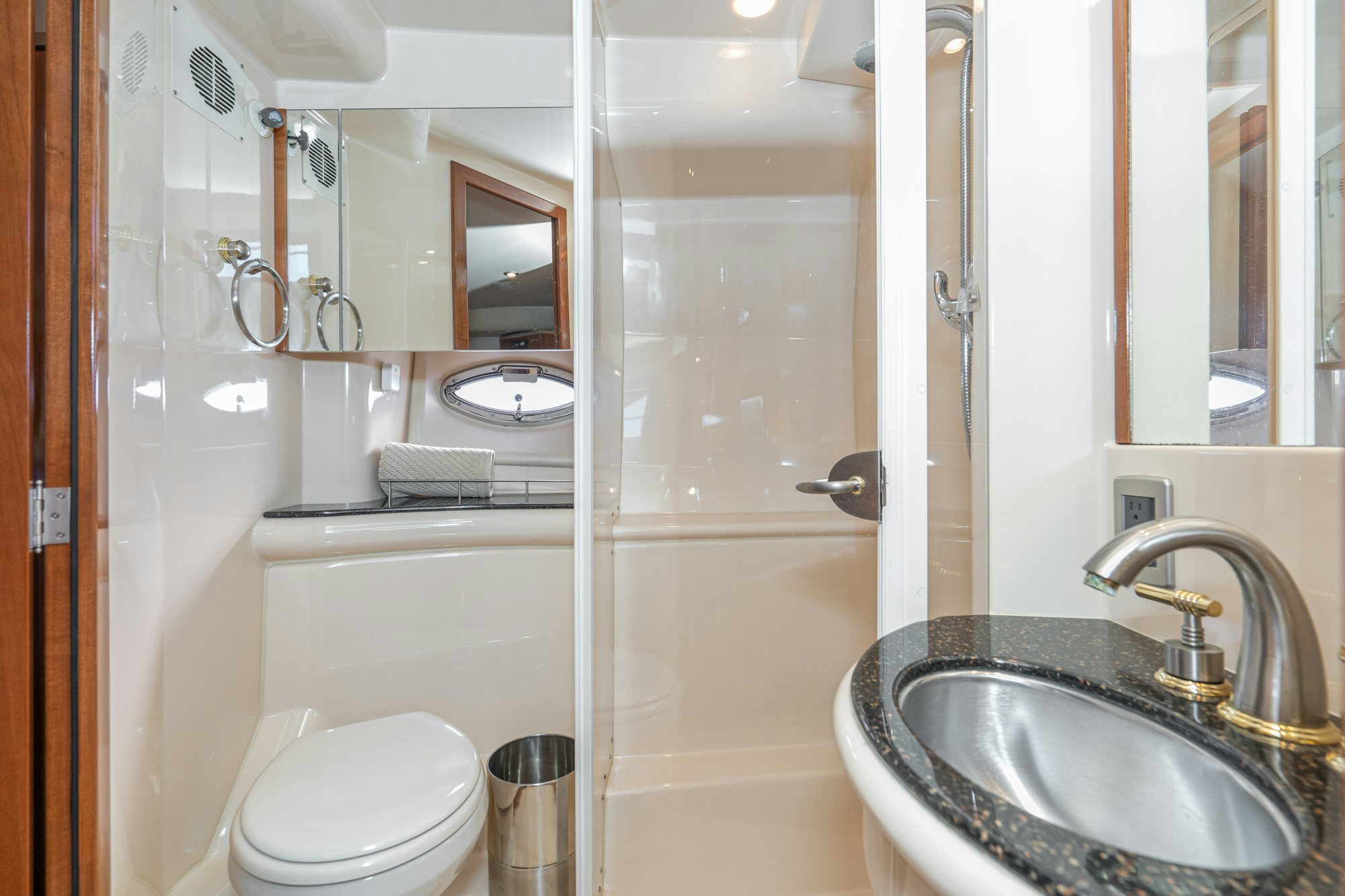 a bathroom with a sink toilet and a shower aboard THE SEA IS FOR ME Yacht for Sale