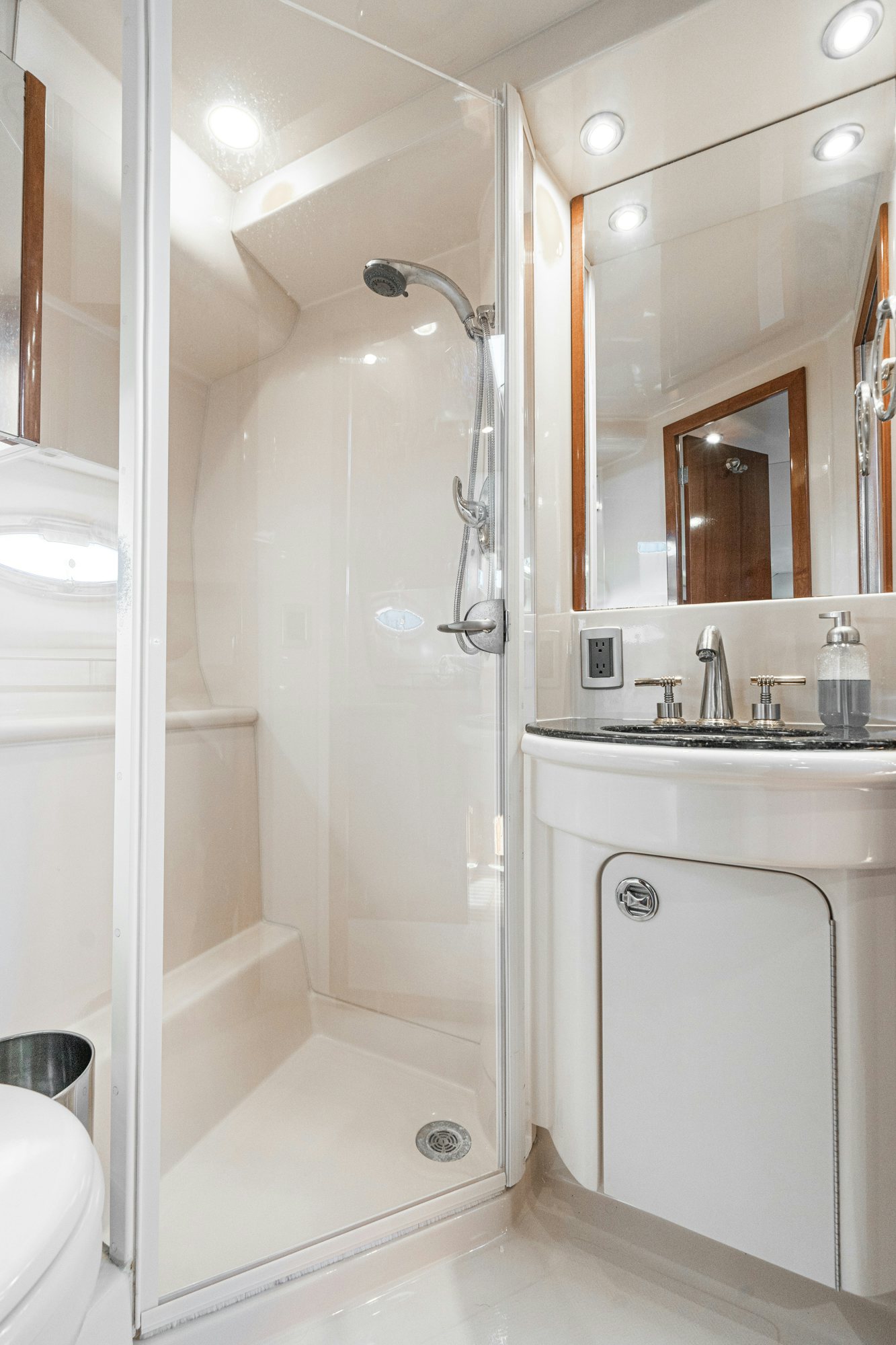 a bathroom with a shower unit and a sink aboard THE SEA IS FOR ME Yacht for Sale