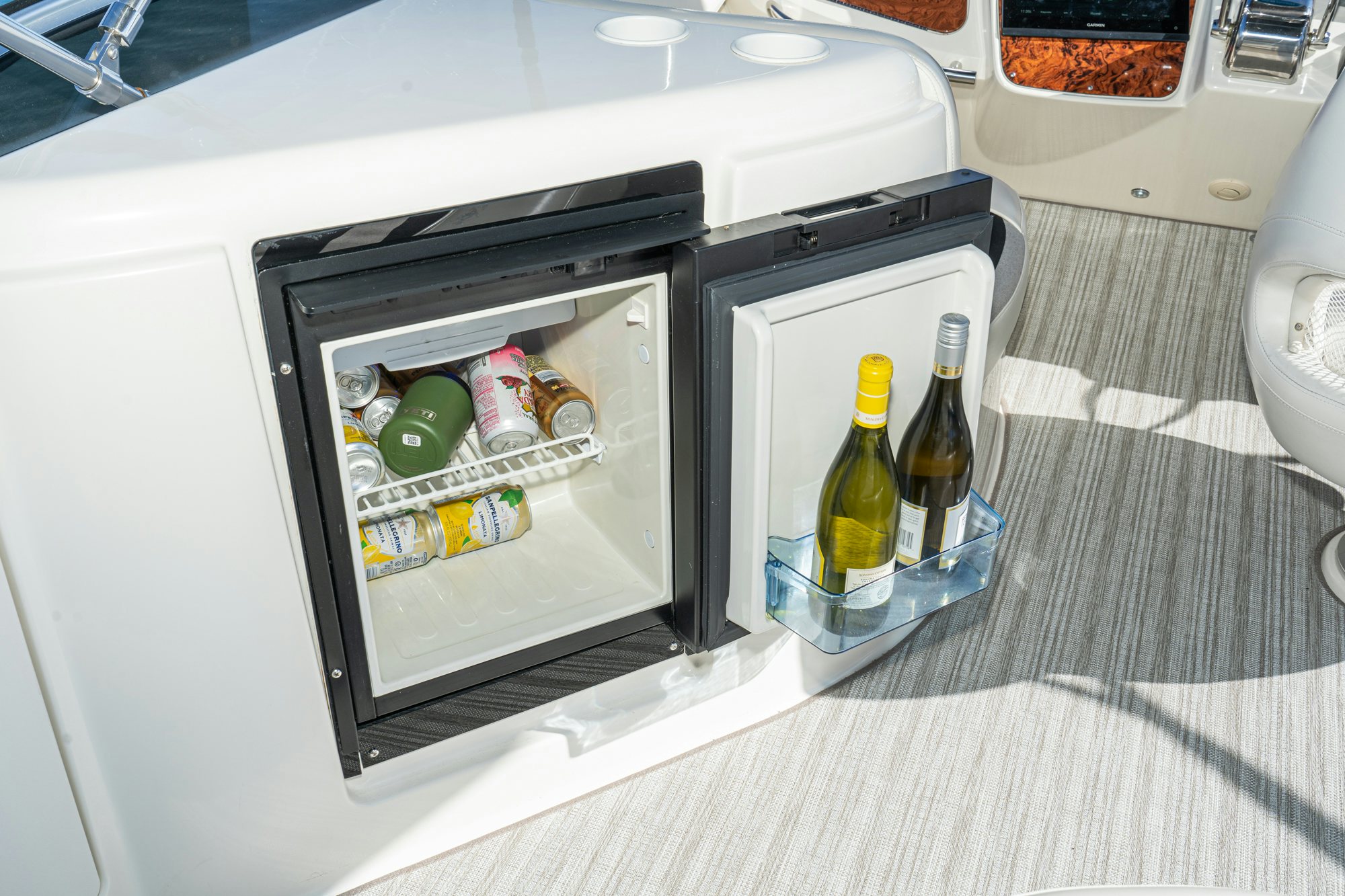 a bottle of beer sits in a microwave aboard THE SEA IS FOR ME Yacht for Sale