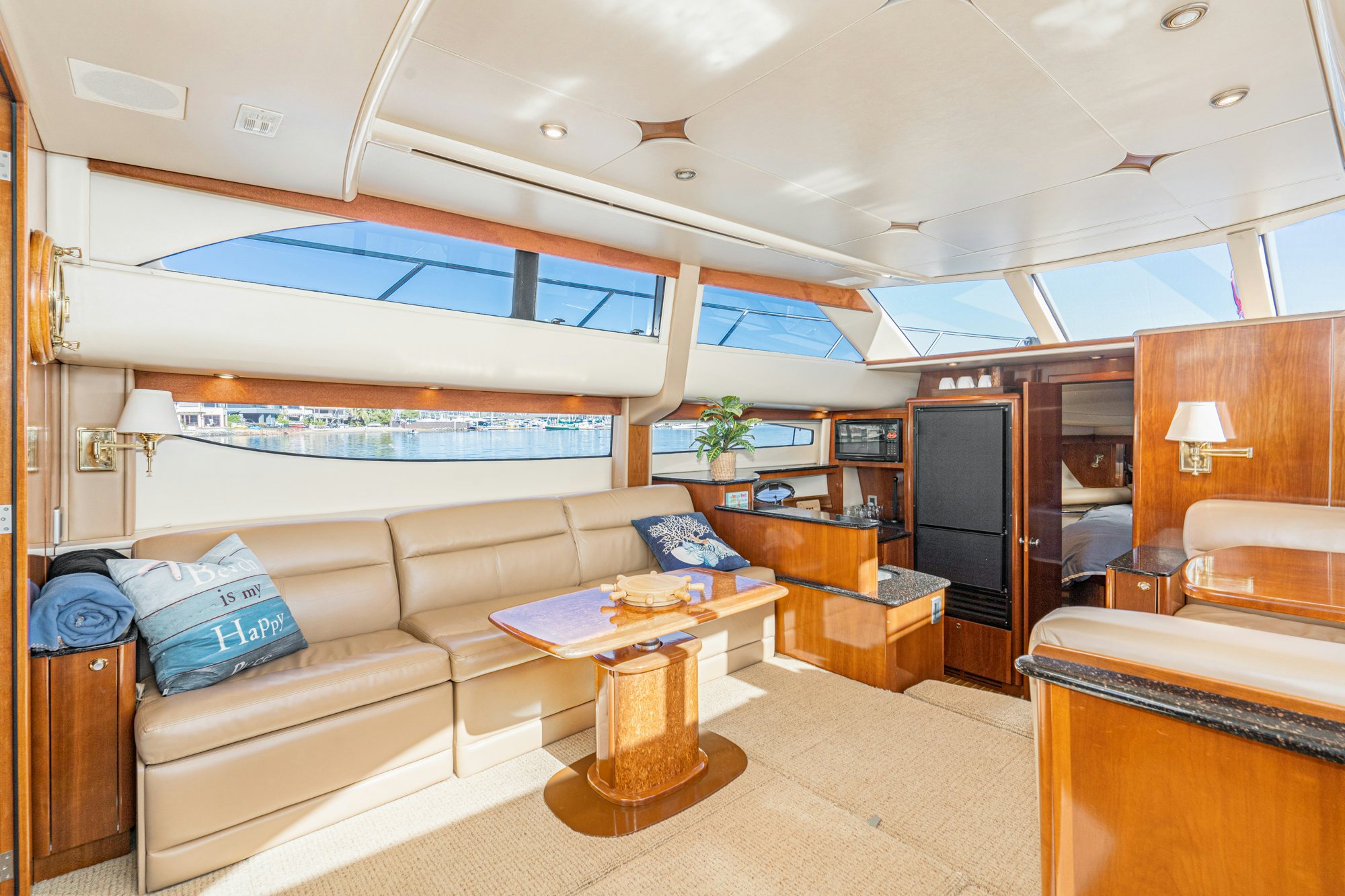 a room with a couch and a table aboard THE SEA IS FOR ME Yacht for Sale