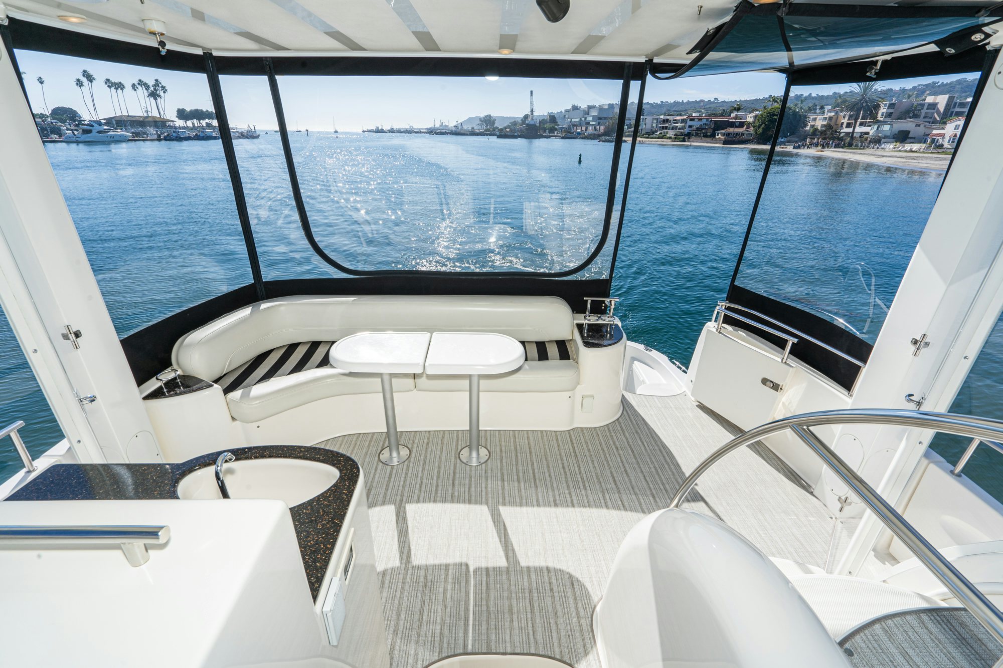 a boat with a table and chairs aboard THE SEA IS FOR ME Yacht for Sale