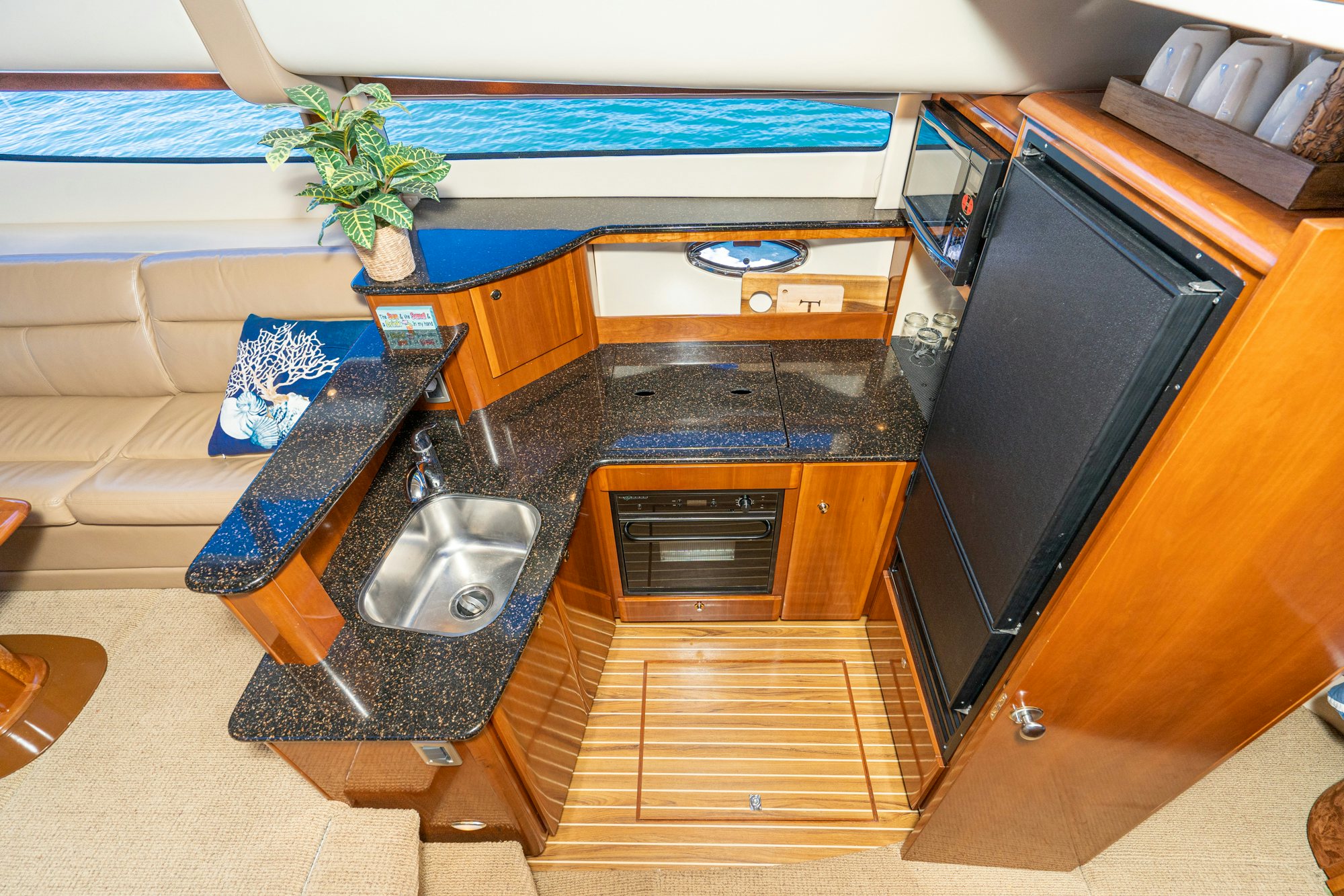a kitchen with a sink and a counter aboard THE SEA IS FOR ME Yacht for Sale