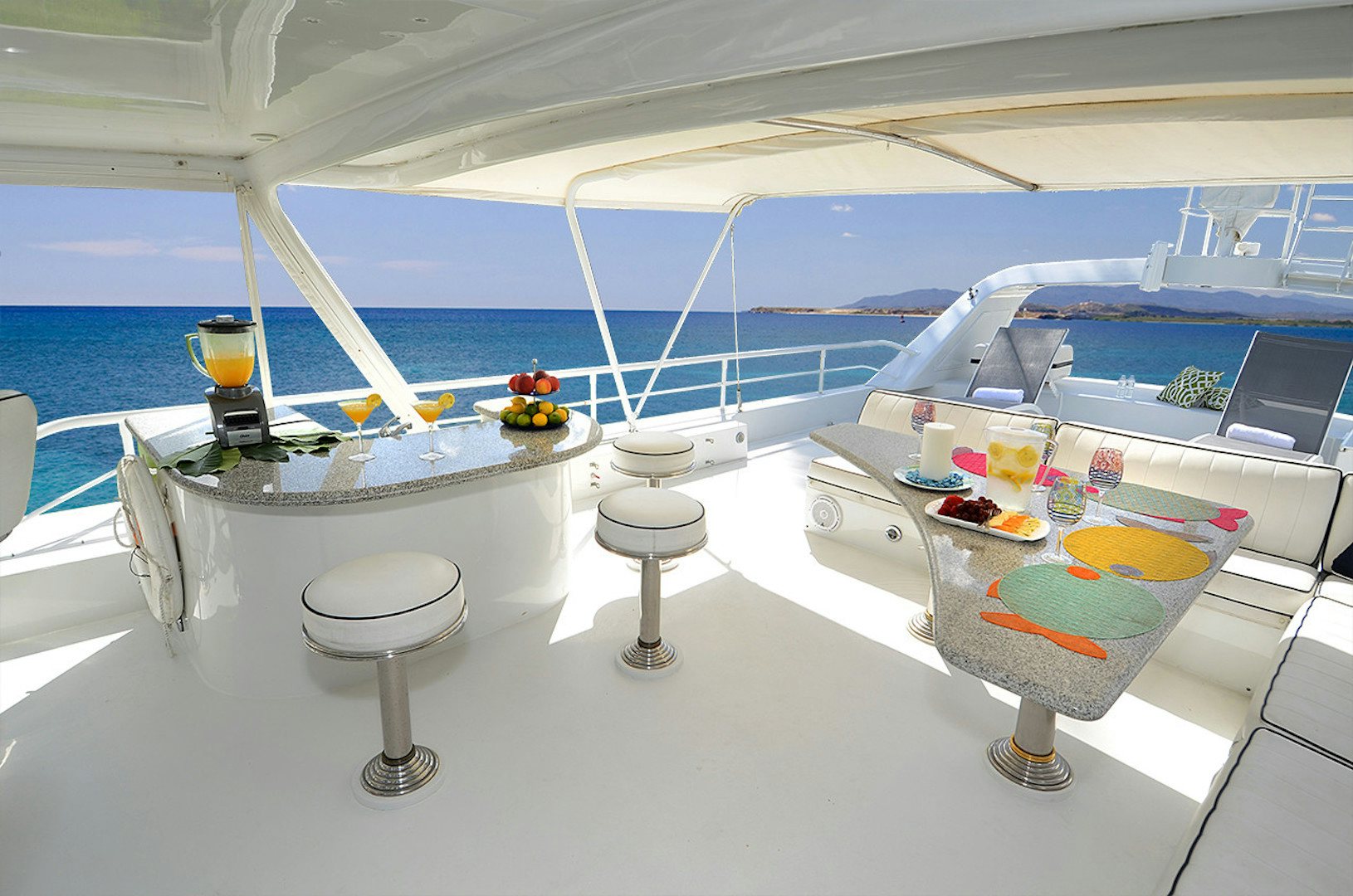 a table with a glass window aboard SUITE LIFE Yacht for Sale