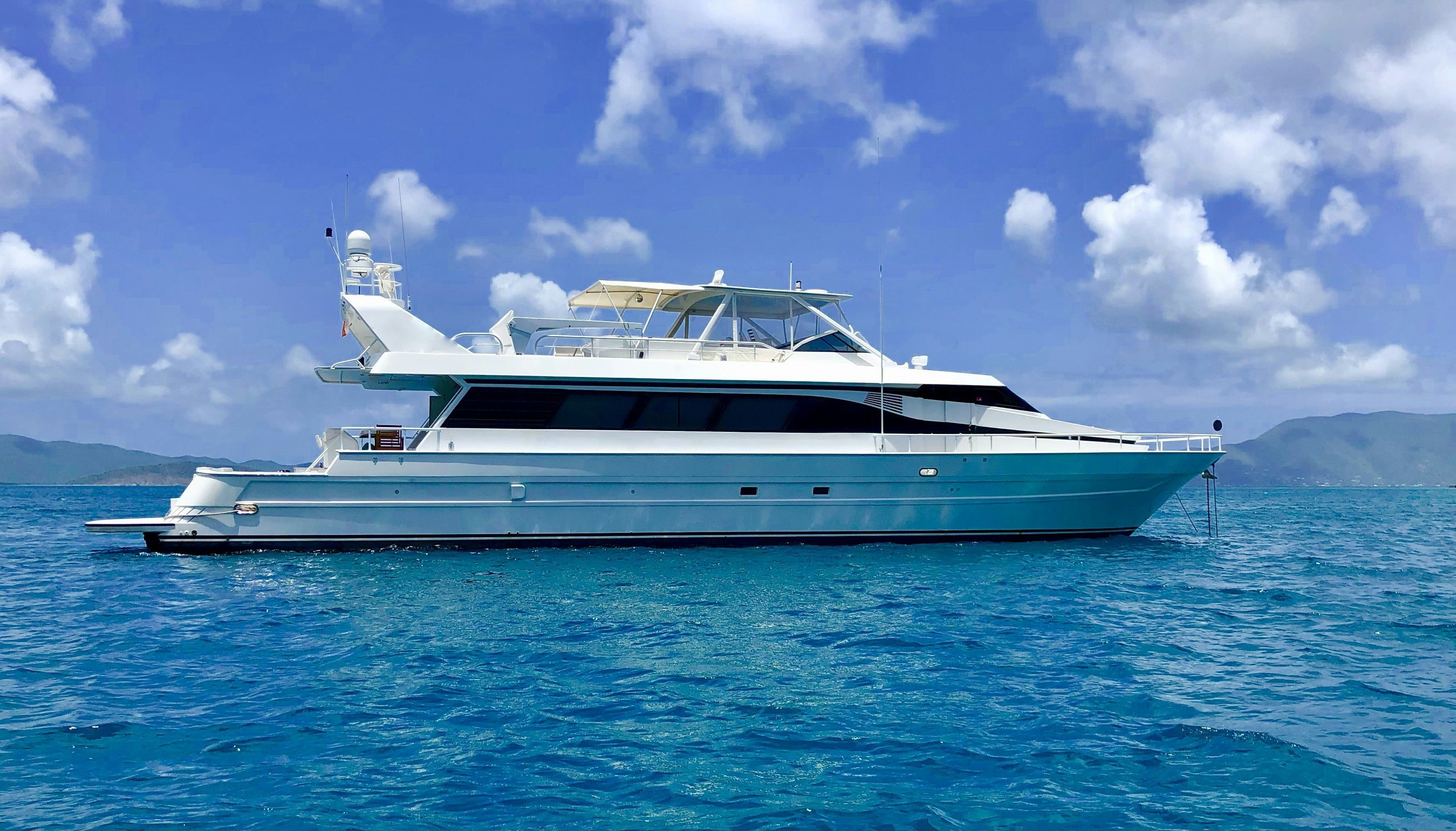 a white yacht in the water aboard SUITE LIFE Yacht for Sale