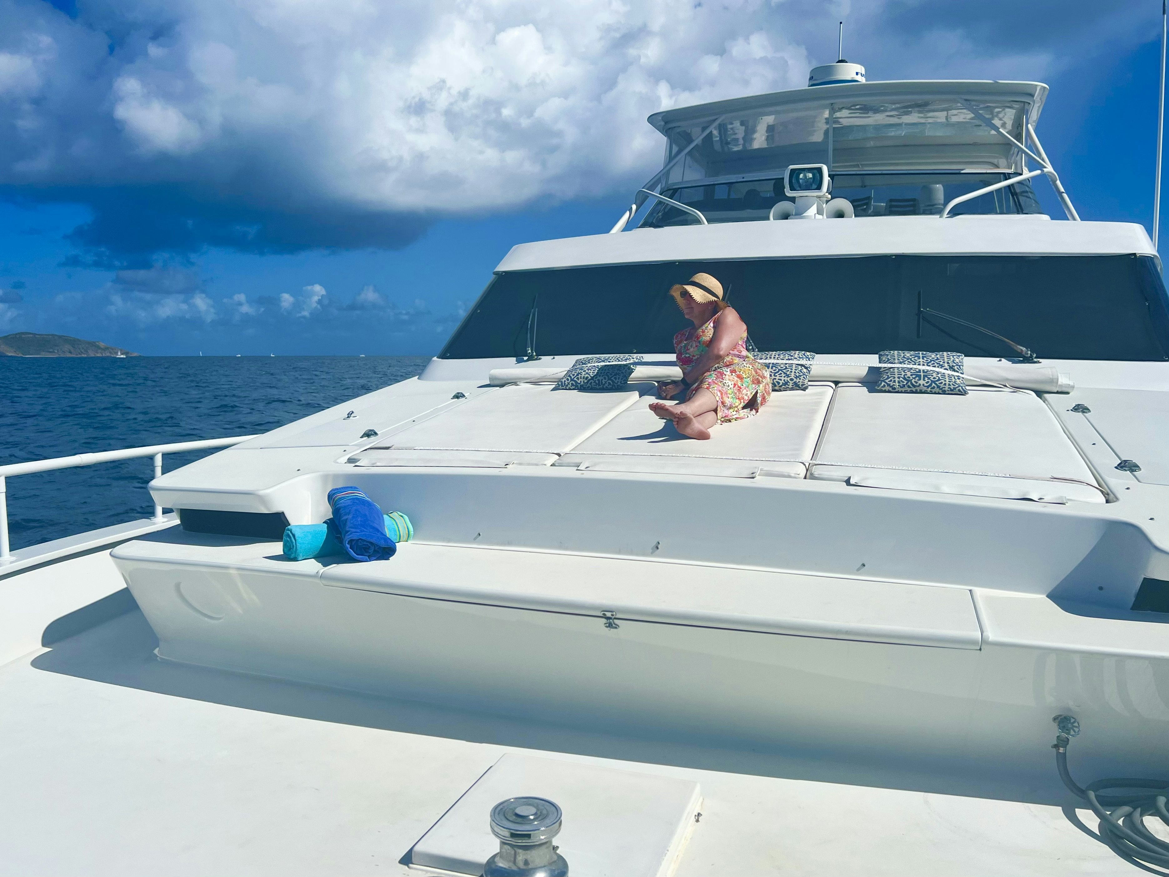 a child sitting on a boat aboard SUITE LIFE Yacht for Sale