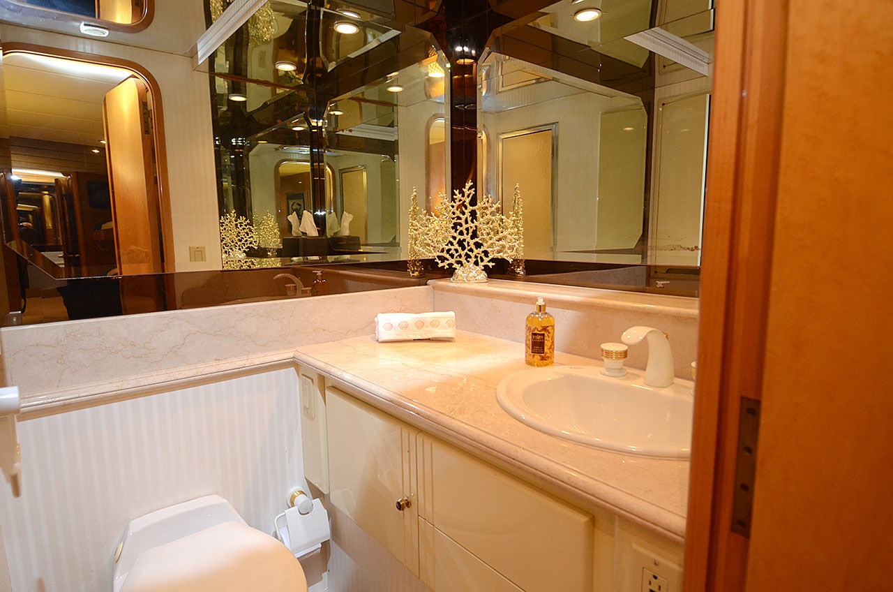 a bathroom with a large mirror aboard SUITE LIFE Yacht for Sale