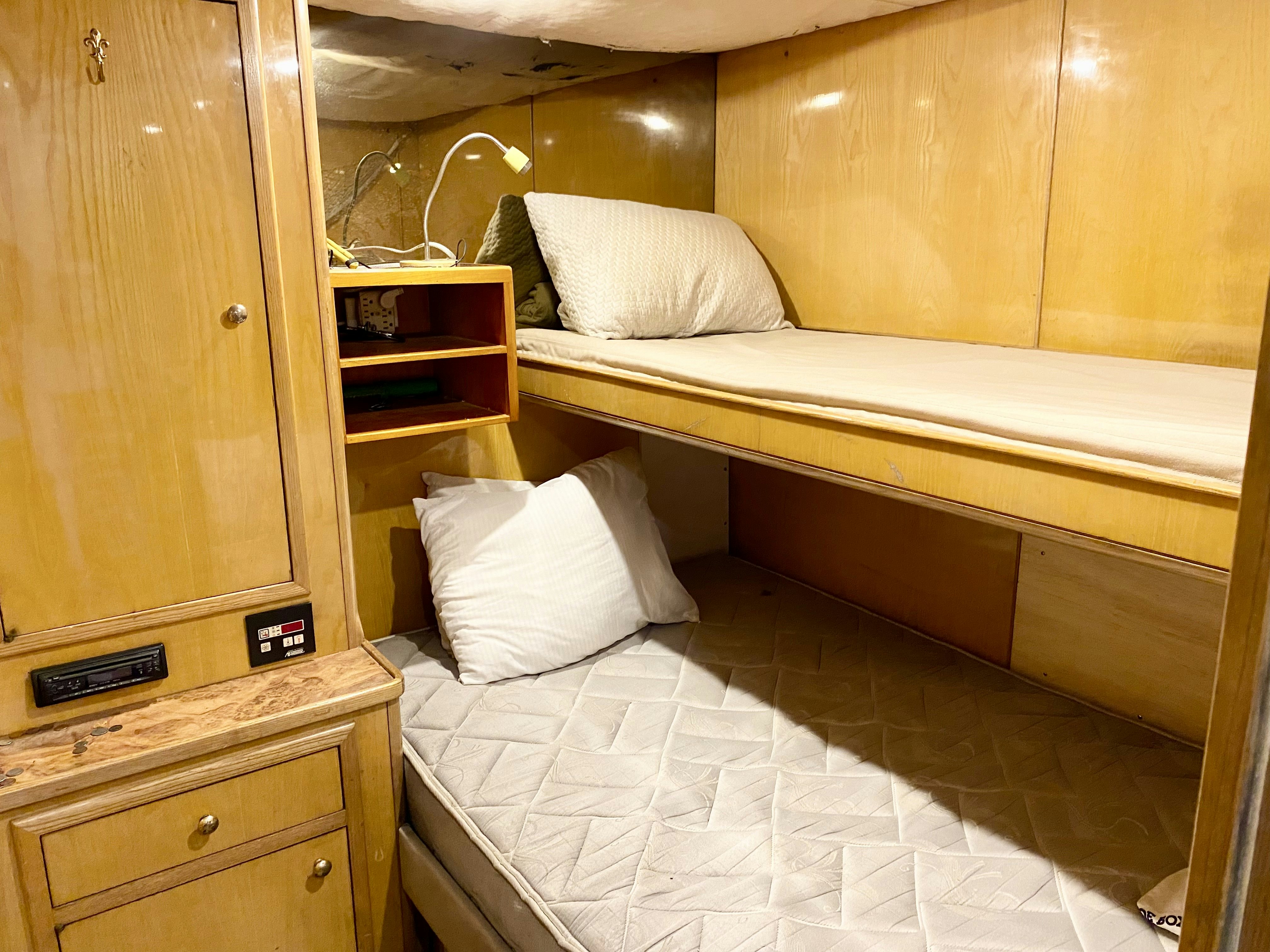 a bed in a room aboard SUITE LIFE Yacht for Sale