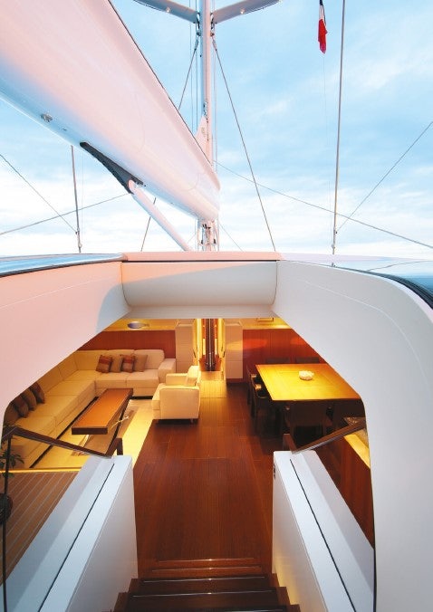 a room with a wood floor and a yellow desk aboard MIRASOL Yacht for Sale