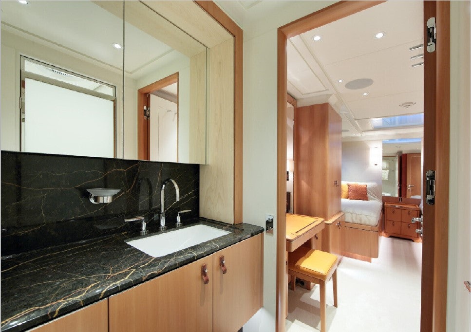 a bathroom with a black countertop aboard MIRASOL Yacht for Sale