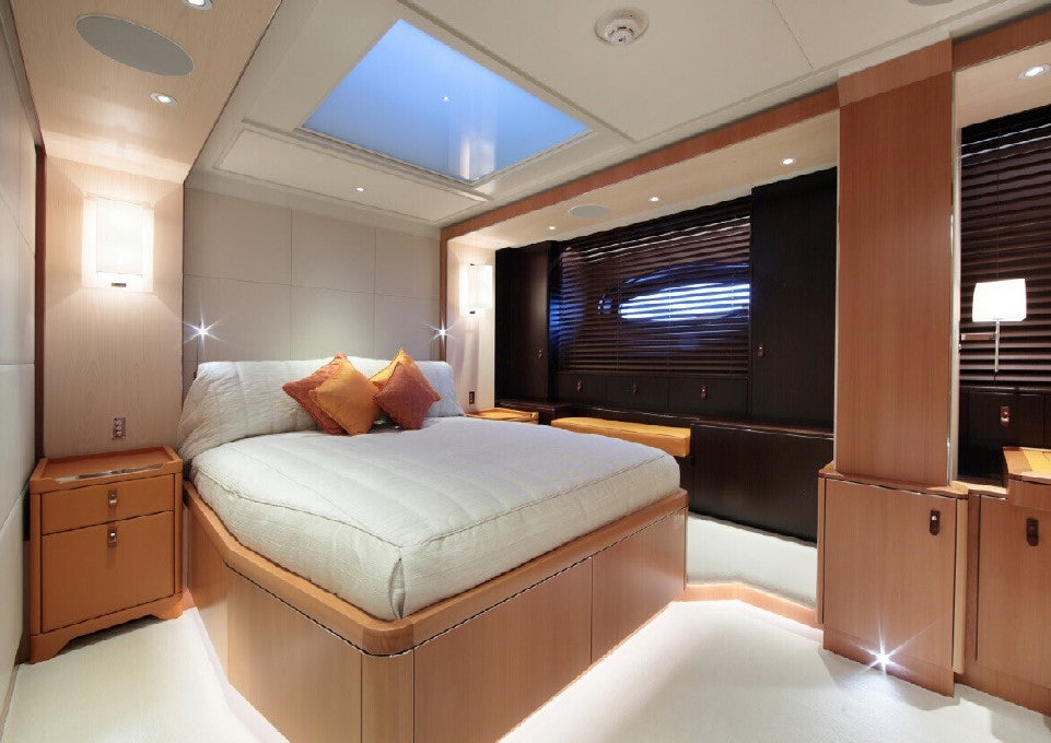 a bed in a room aboard MIRASOL Yacht for Sale
