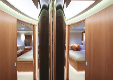 a room with a bed and a couch aboard MIRASOL Yacht for Sale