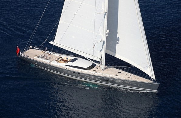 a white sailboat on the water aboard MIRASOL Yacht for Sale