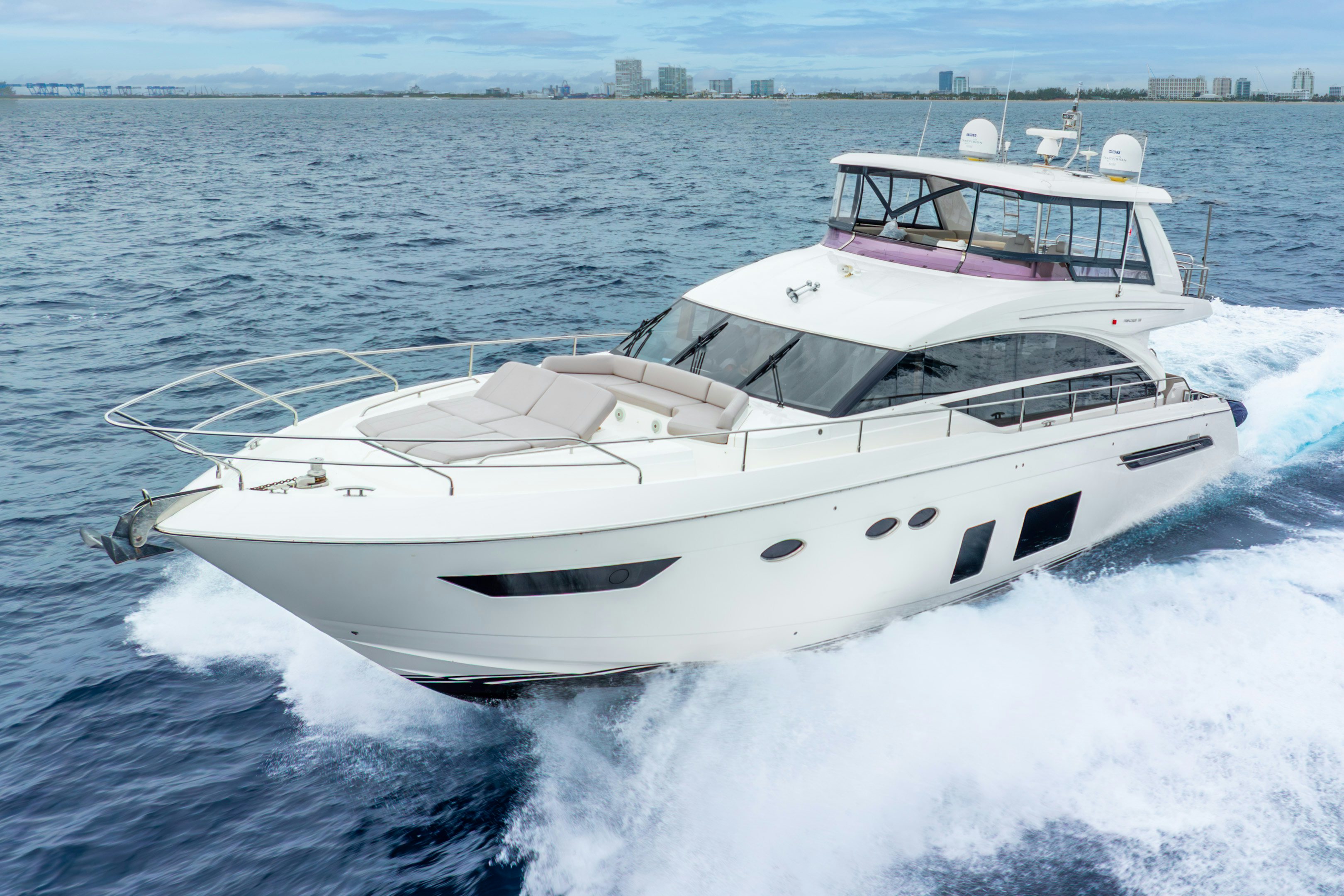 a white yacht on the water aboard MAMU Yacht for Sale