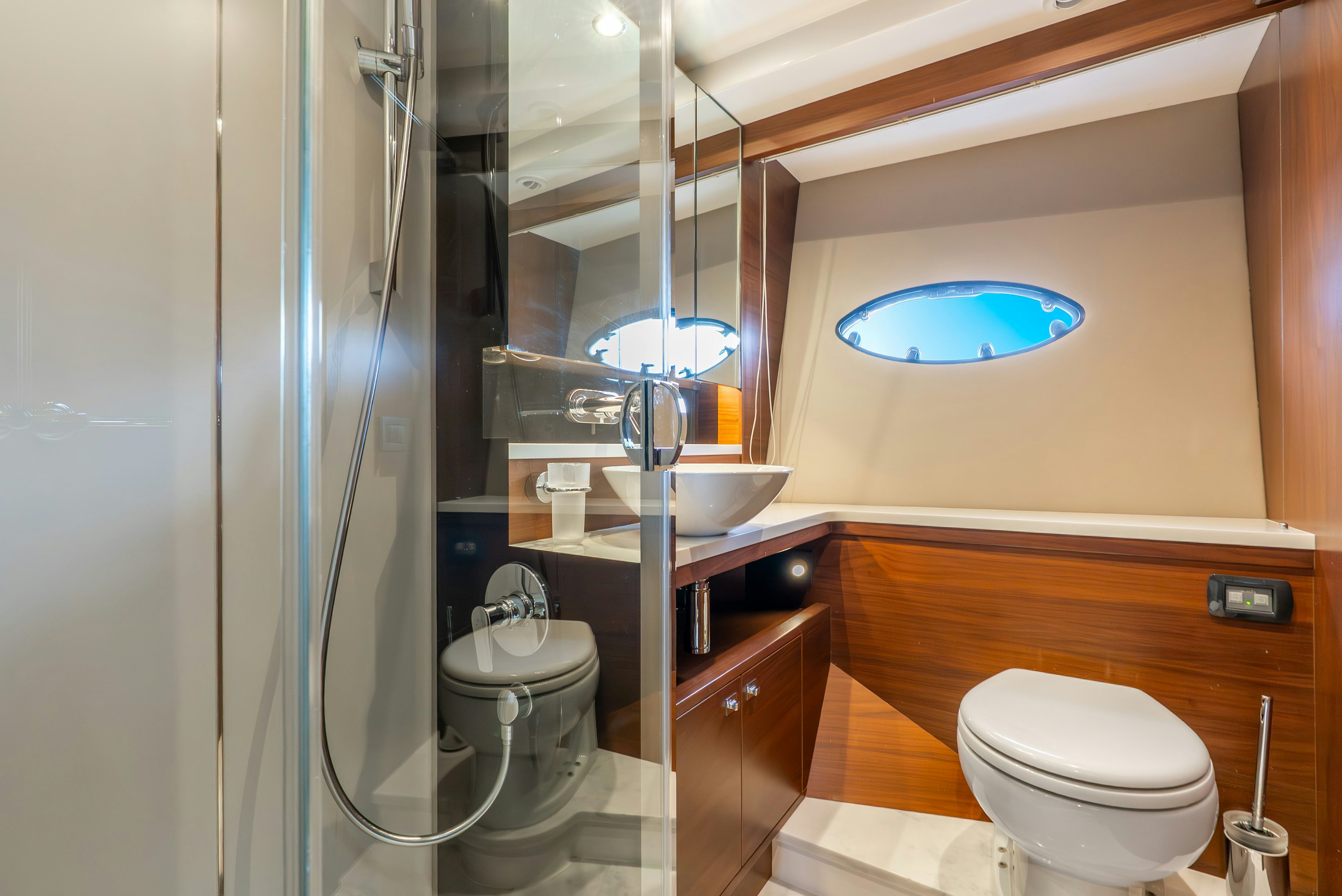 a bathroom with a glass shower aboard MAMU Yacht for Sale