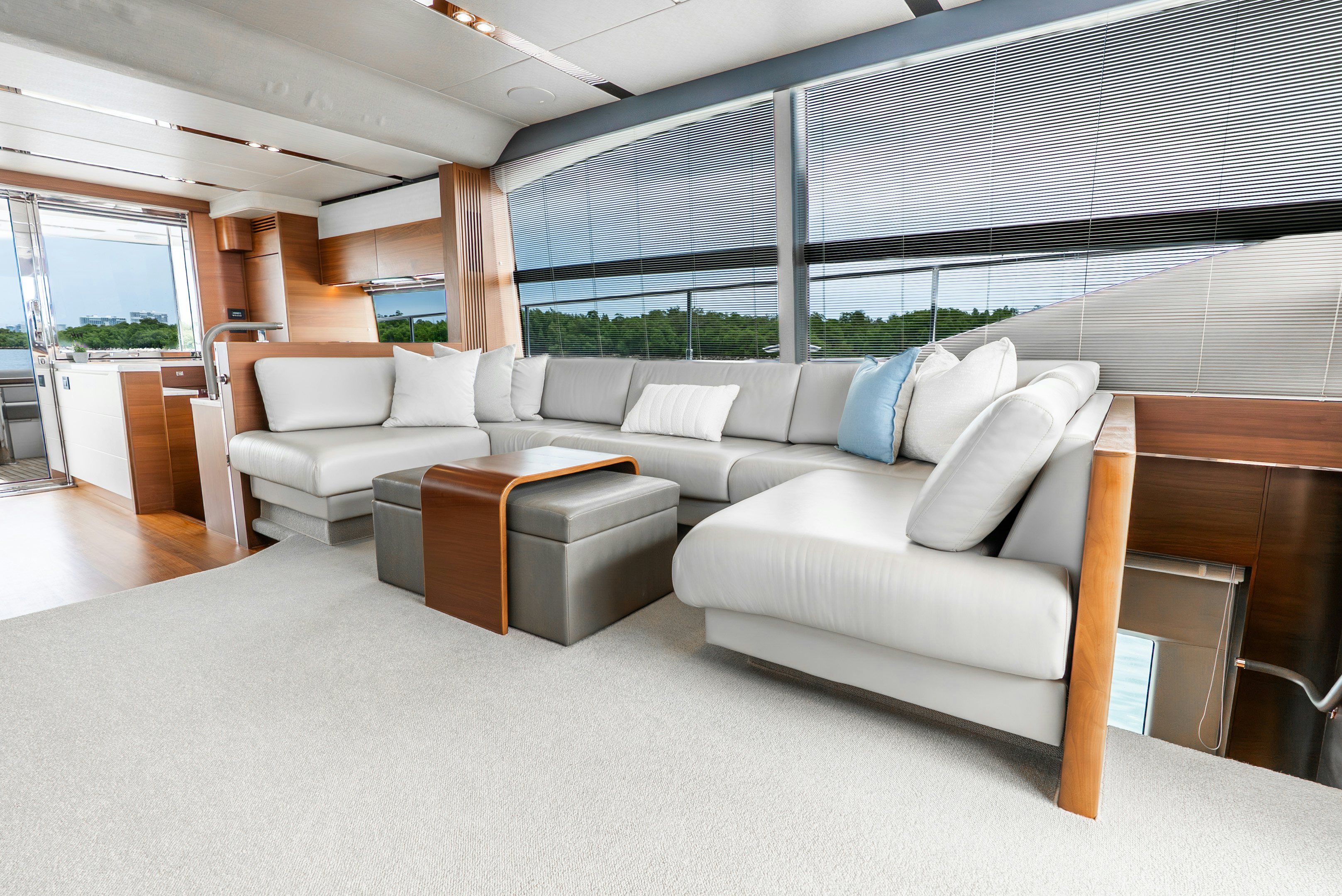 a living room with a couch and a table aboard MAMU Yacht for Sale