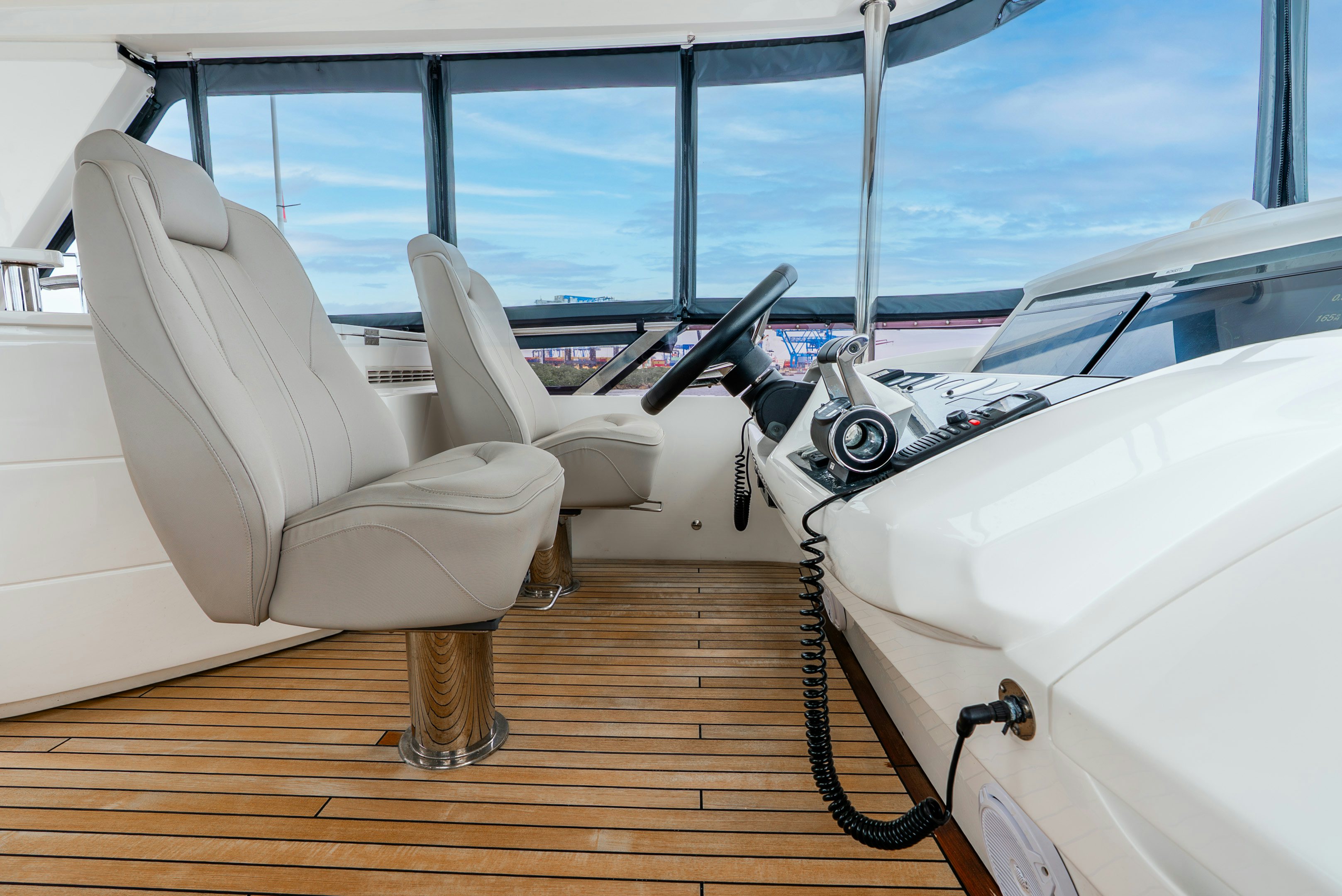 a boat with a seat and a steering wheel aboard MAMU Yacht for Sale