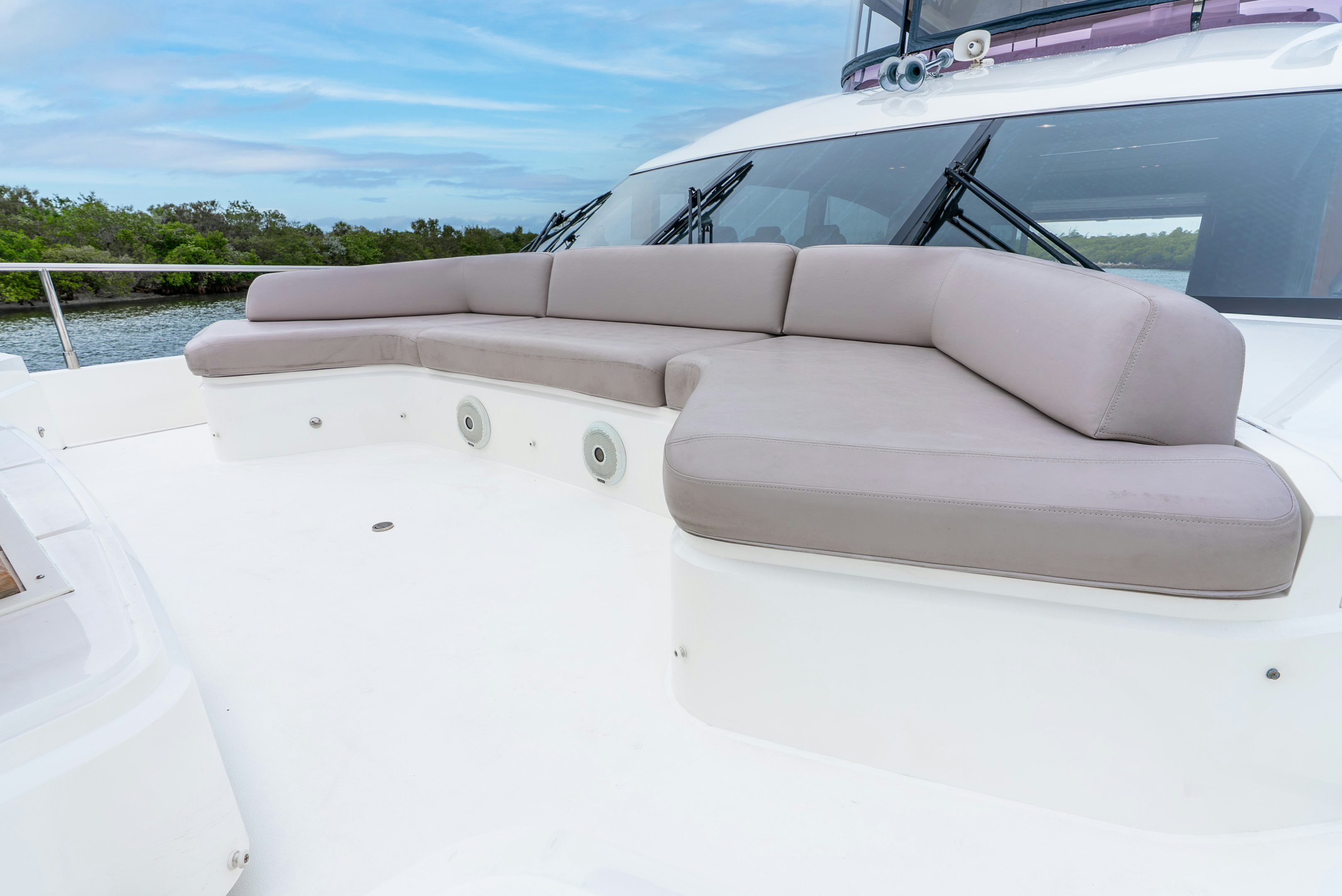 the front of a white car aboard MAMU Yacht for Sale