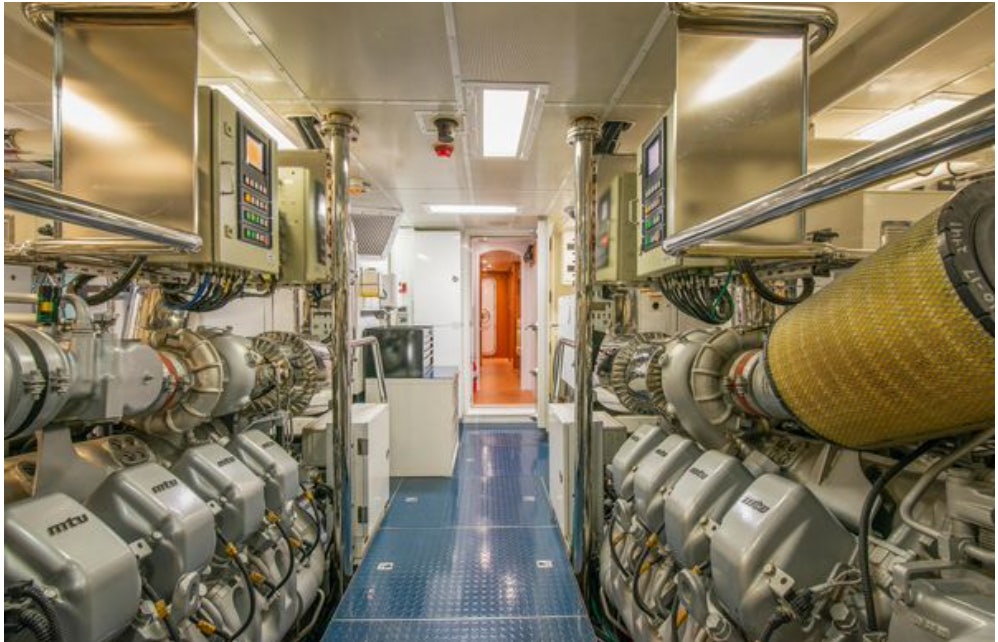 a room with machines aboard HOMECOMING Yacht for Sale