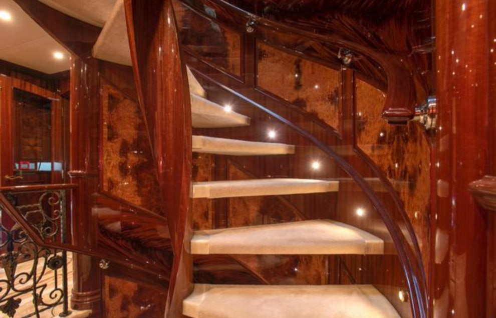 a staircase with a railing aboard HOMECOMING Yacht for Sale