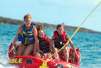 a group of people on a boat aboard RELENTLESS Yacht for Charter
