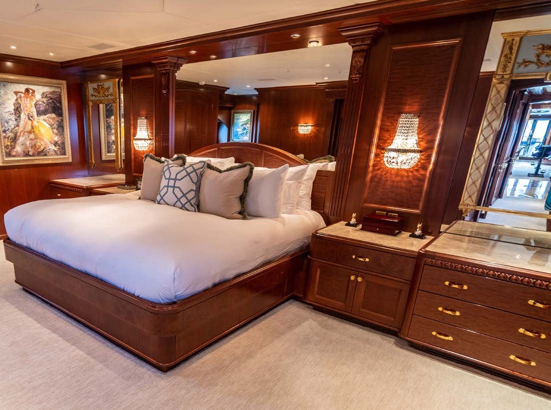 a bed in a room aboard RELENTLESS Yacht for Charter