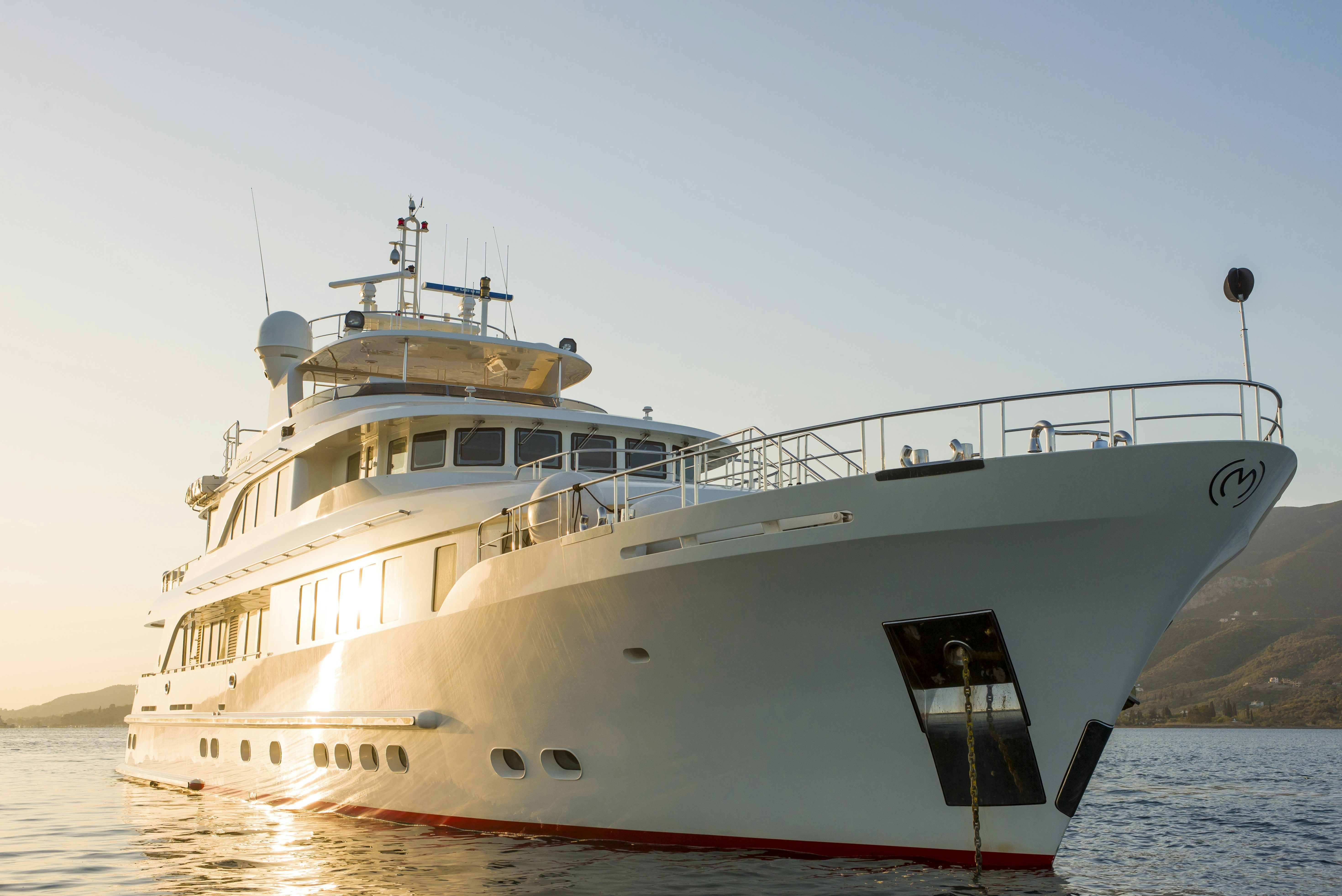 a large white ship aboard METSUYAN IV Yacht for Charter