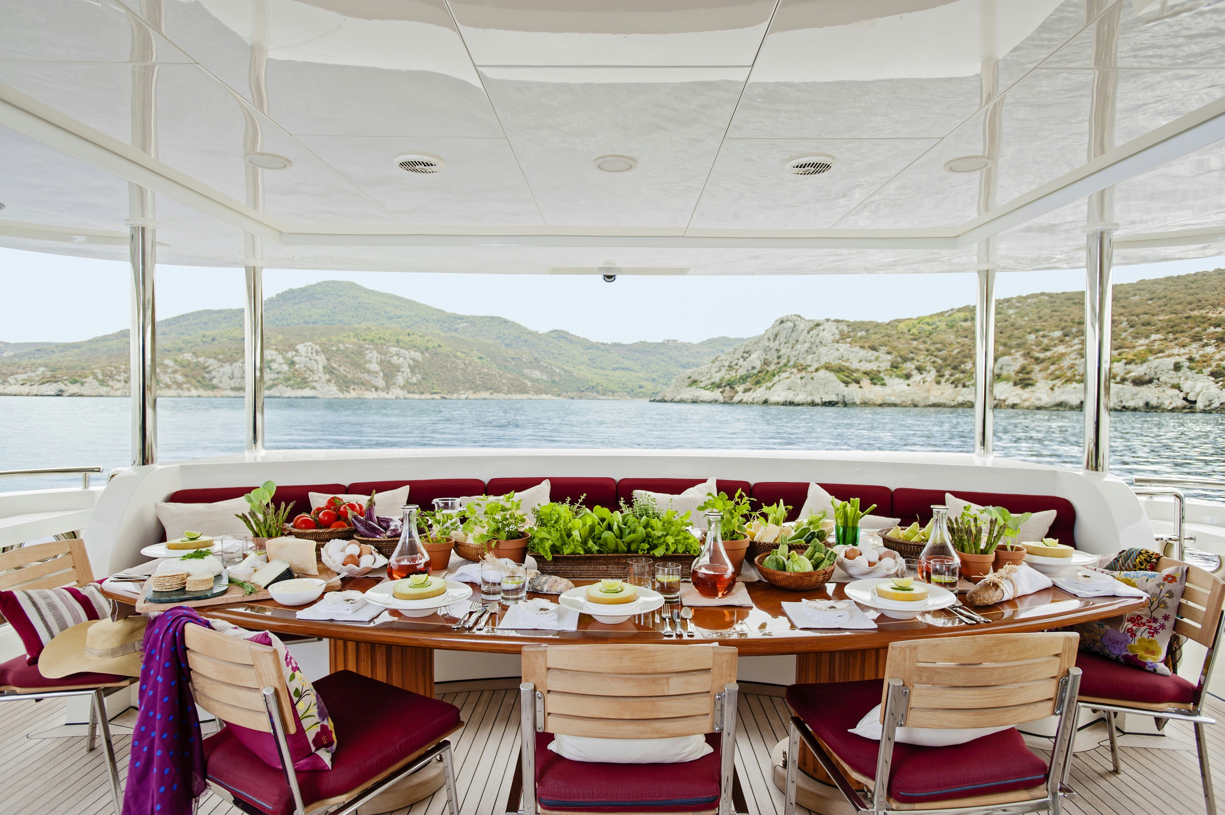 a table set for a meal aboard METSUYAN IV Yacht for Charter
