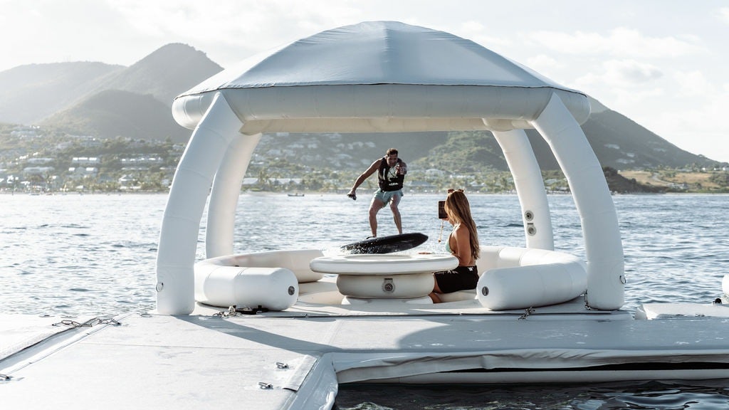a man and woman on a boat aboard LADY BETH Yacht for Charter