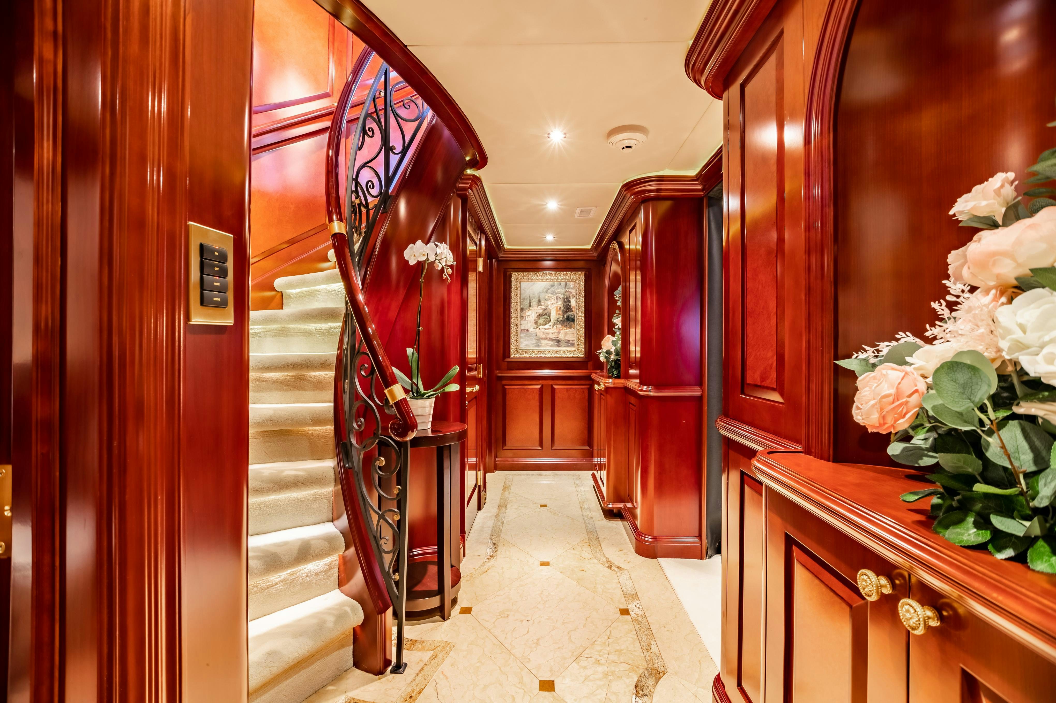 a hallway with wood doors aboard TCB Yacht for Charter