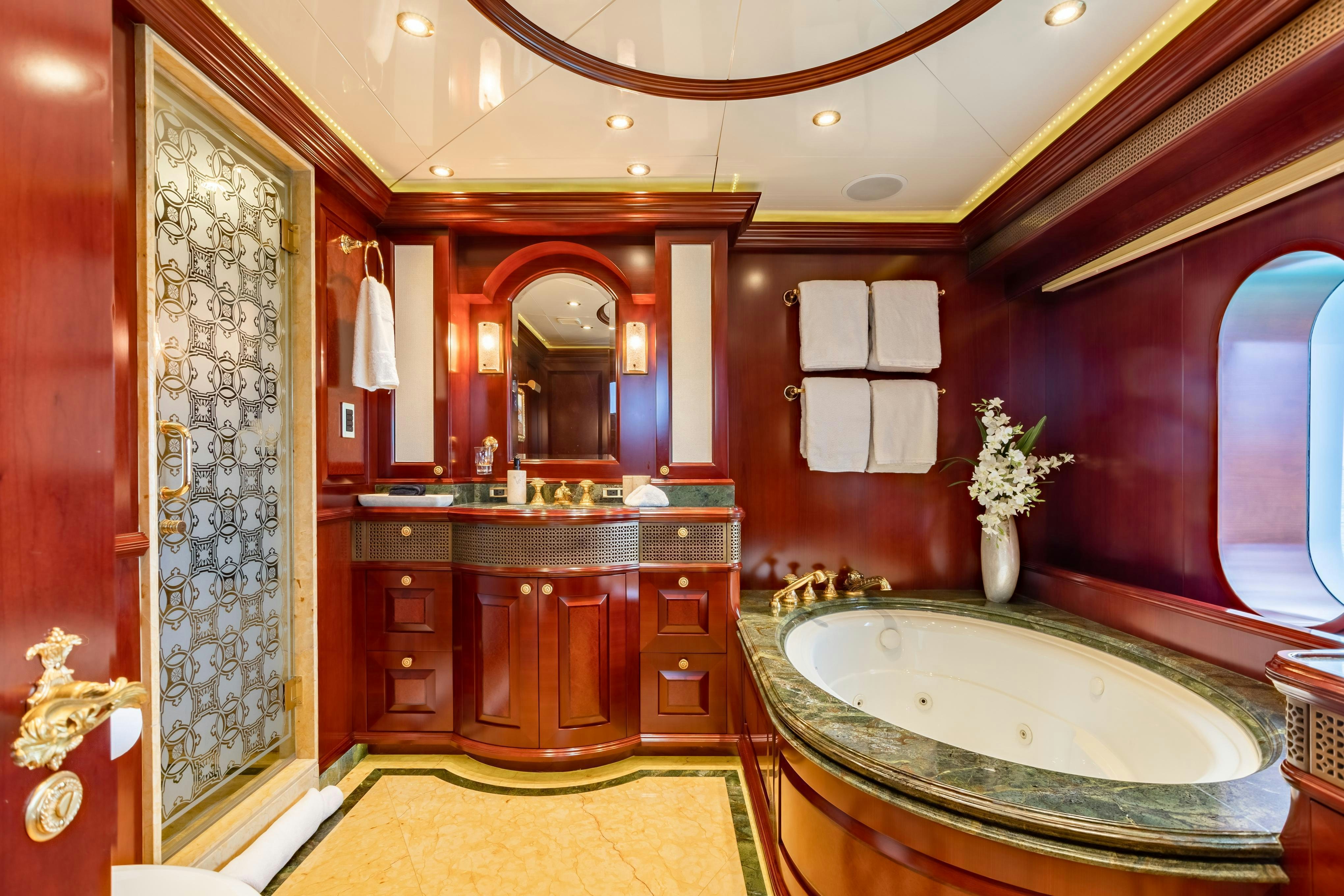 a fancy bathroom with a fancy sink aboard TCB Yacht for Charter